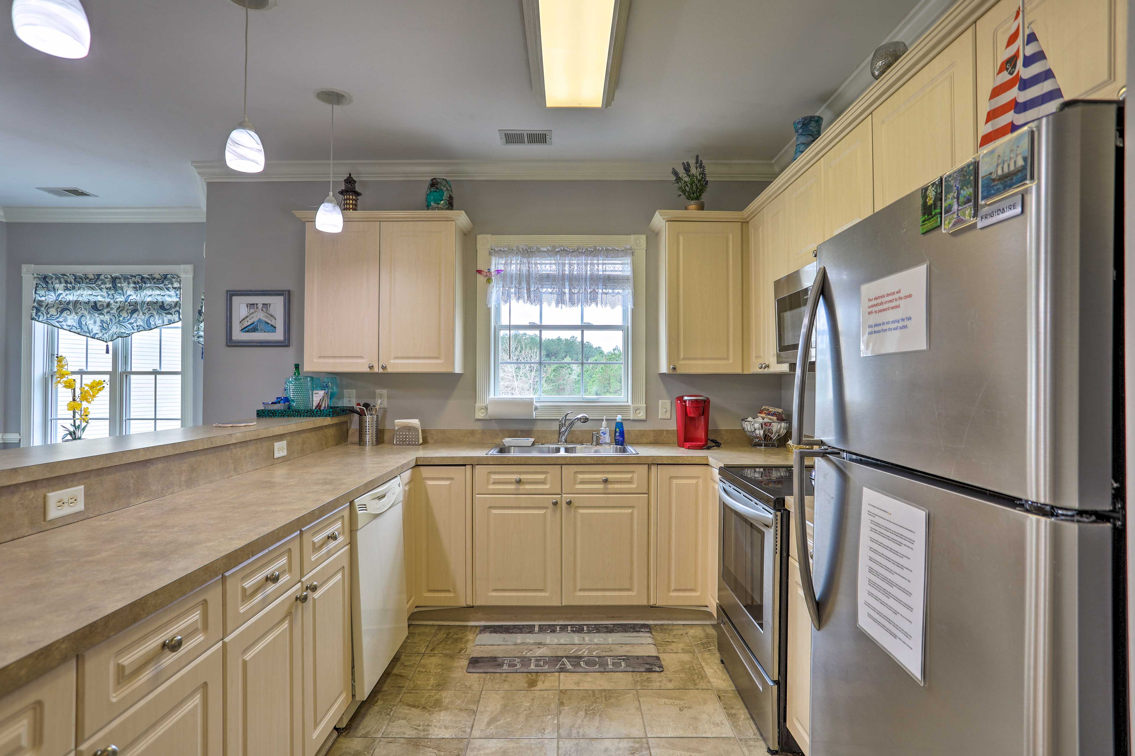 The kitchen comes fully equipped with stainless steel appliances.