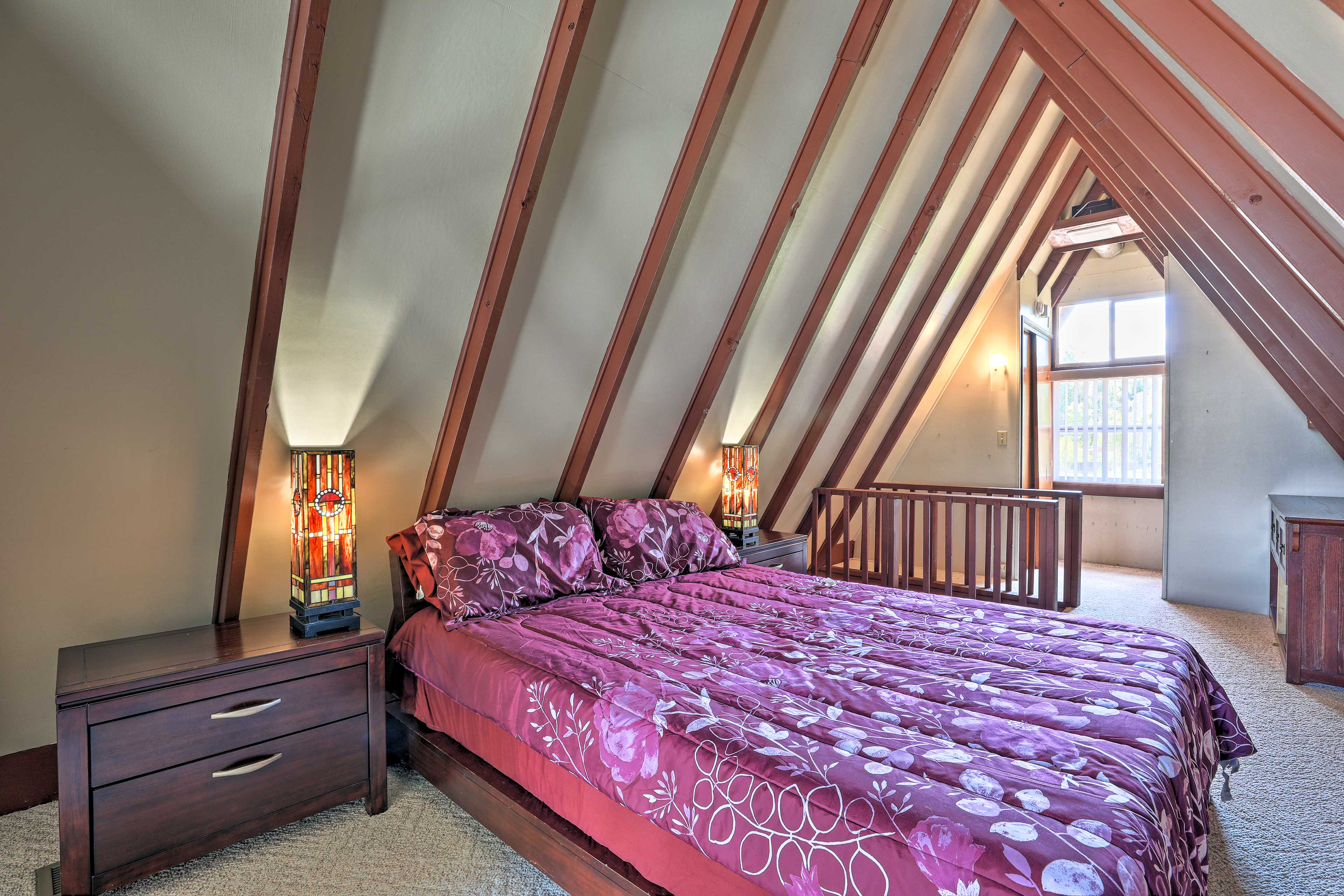 The loft features a queen-sized bed.