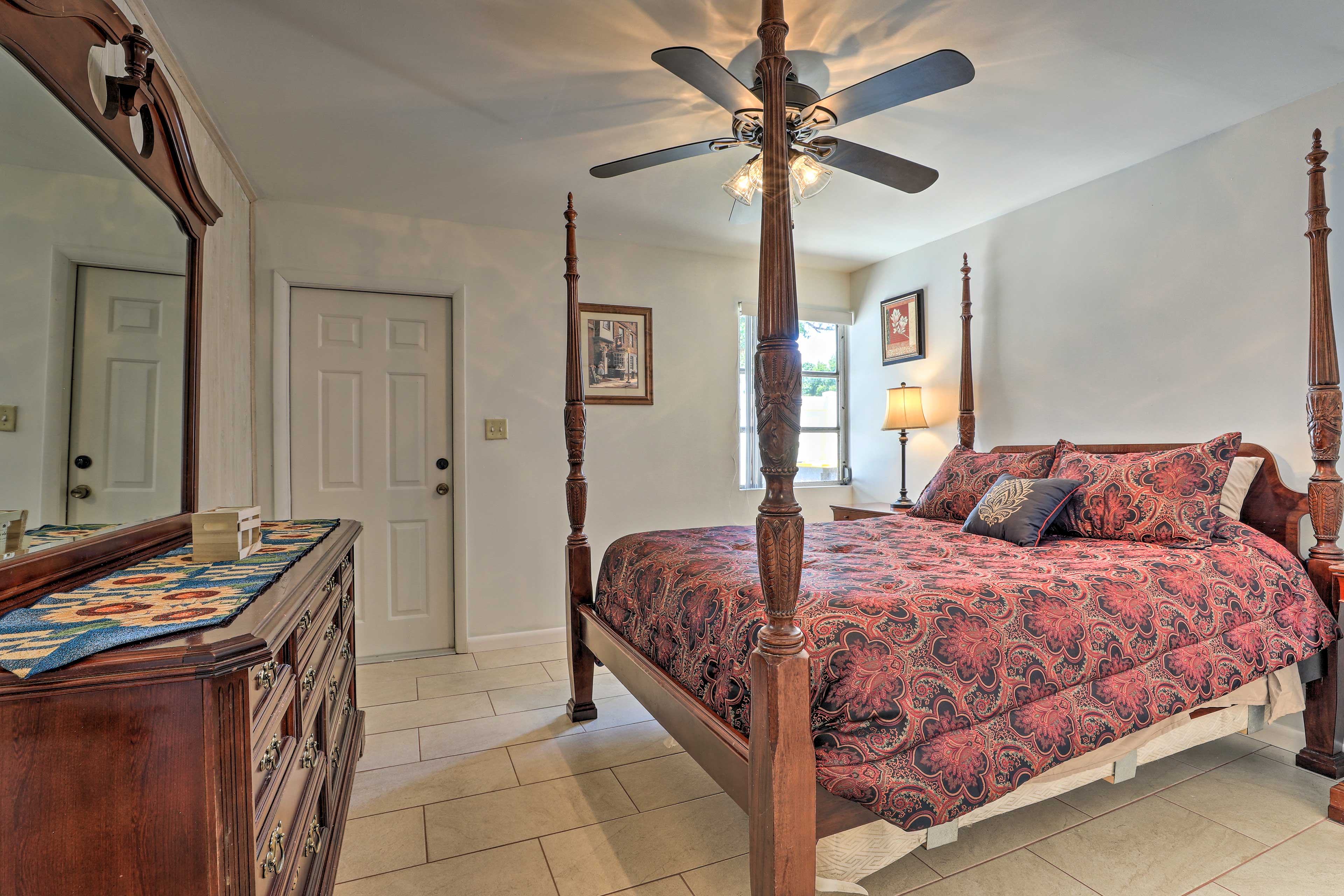 The second bedroom has a queen-sized bed.