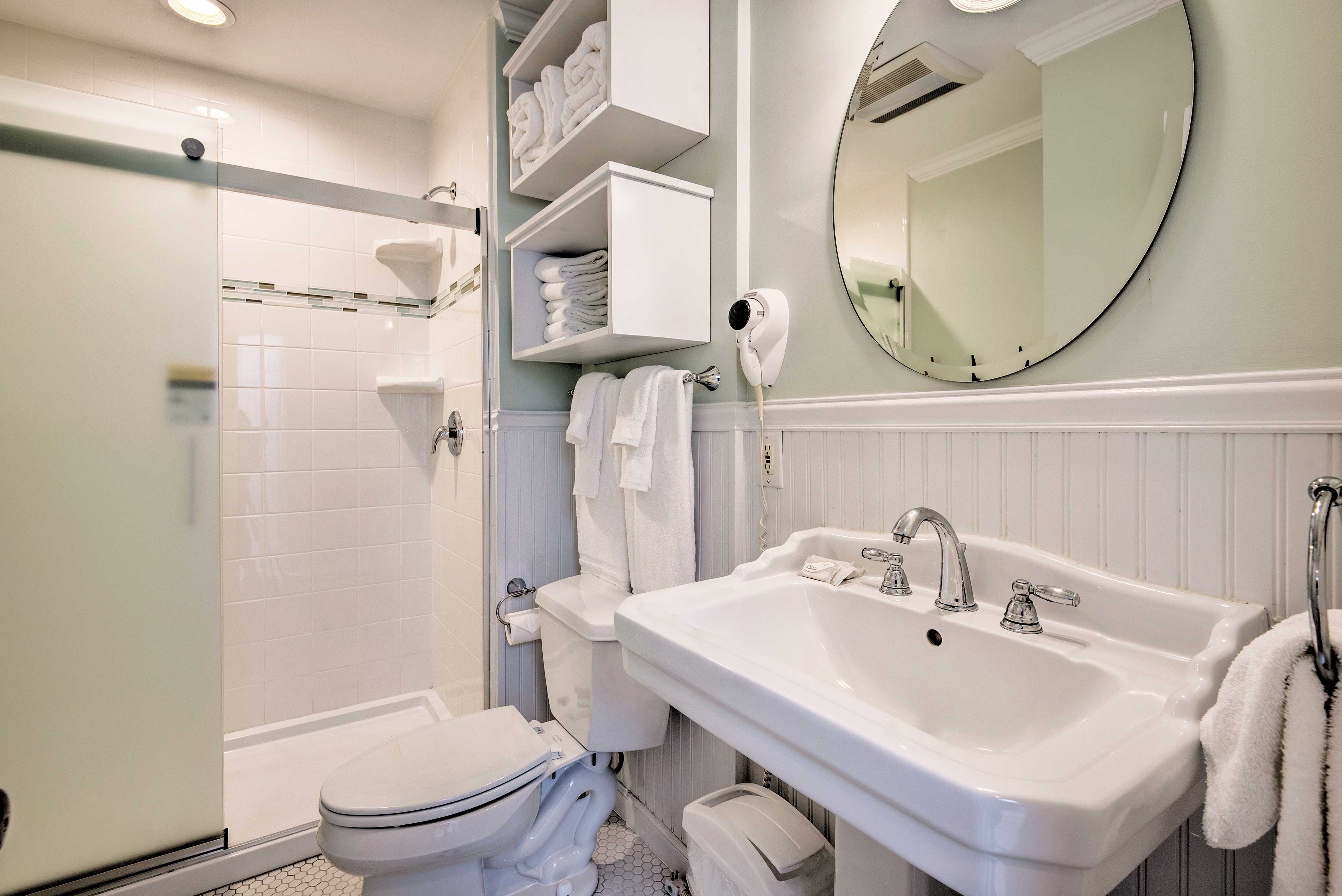 The recently renovated full bath is stocked with plenty of towels for your use.