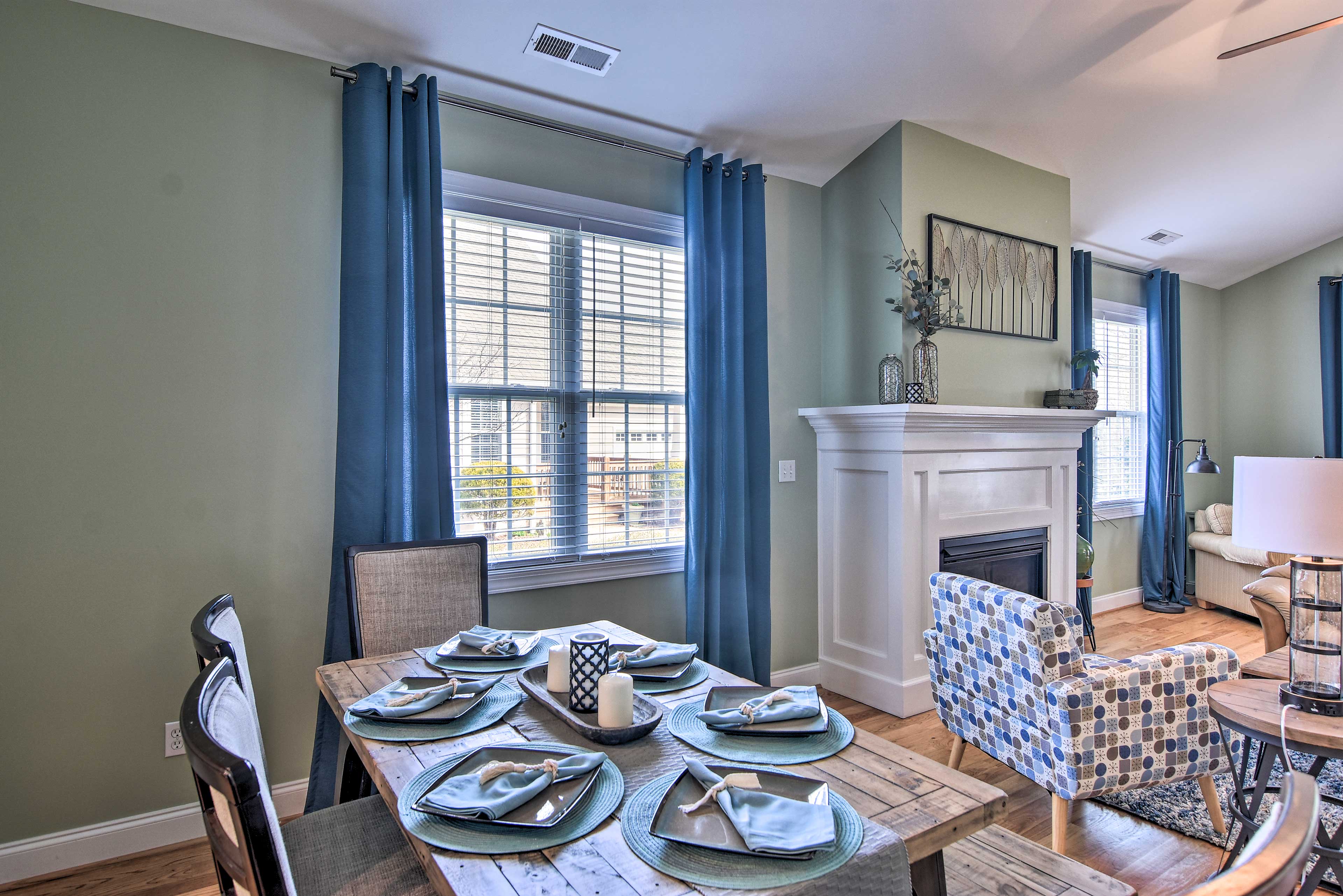 Turn on the fireplace and have a cozy dinner at the farmhouse-style dining table