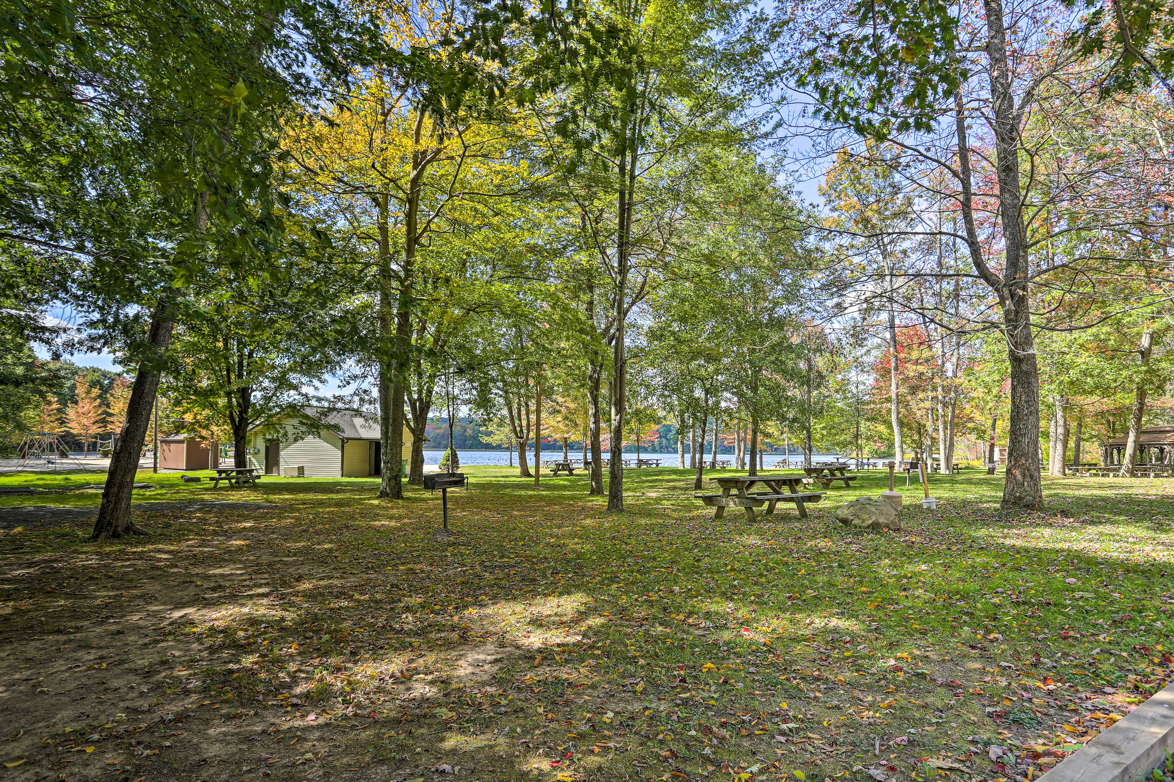 Surrounded by foliage and lakes, this home offers plenty of nearby activities.