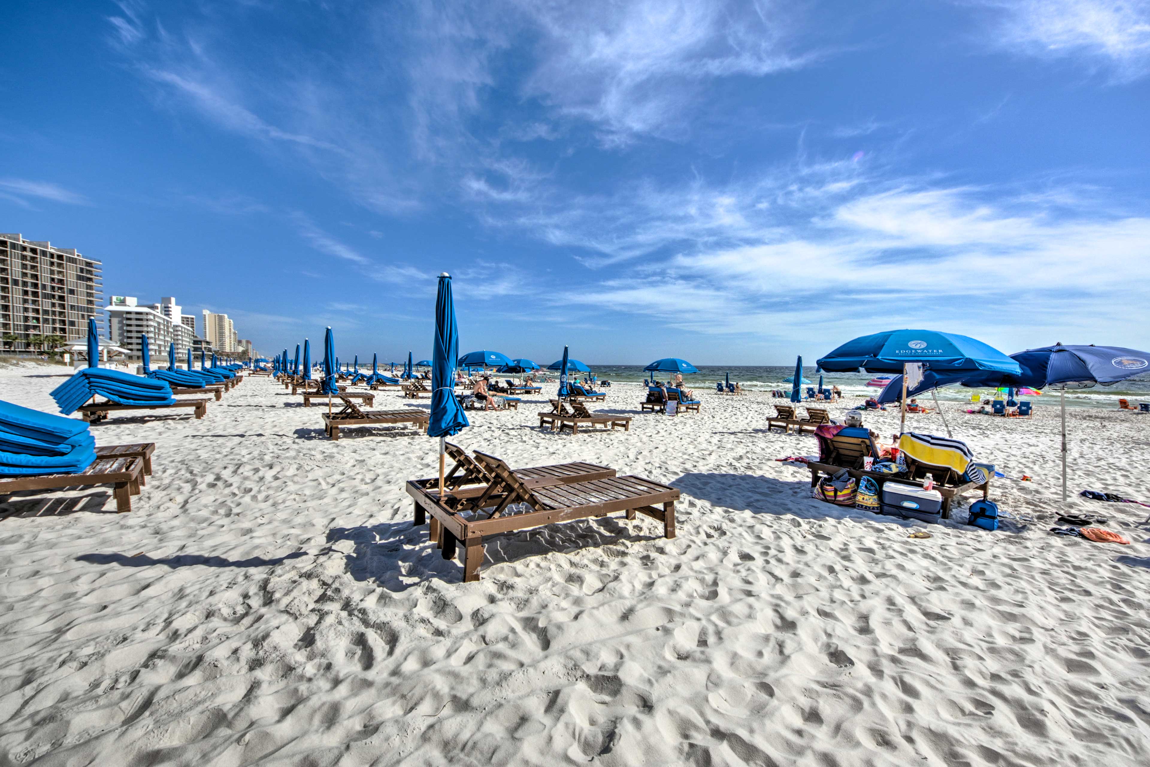 Claim a set of lounge chairs & settle in for a day in the sand.