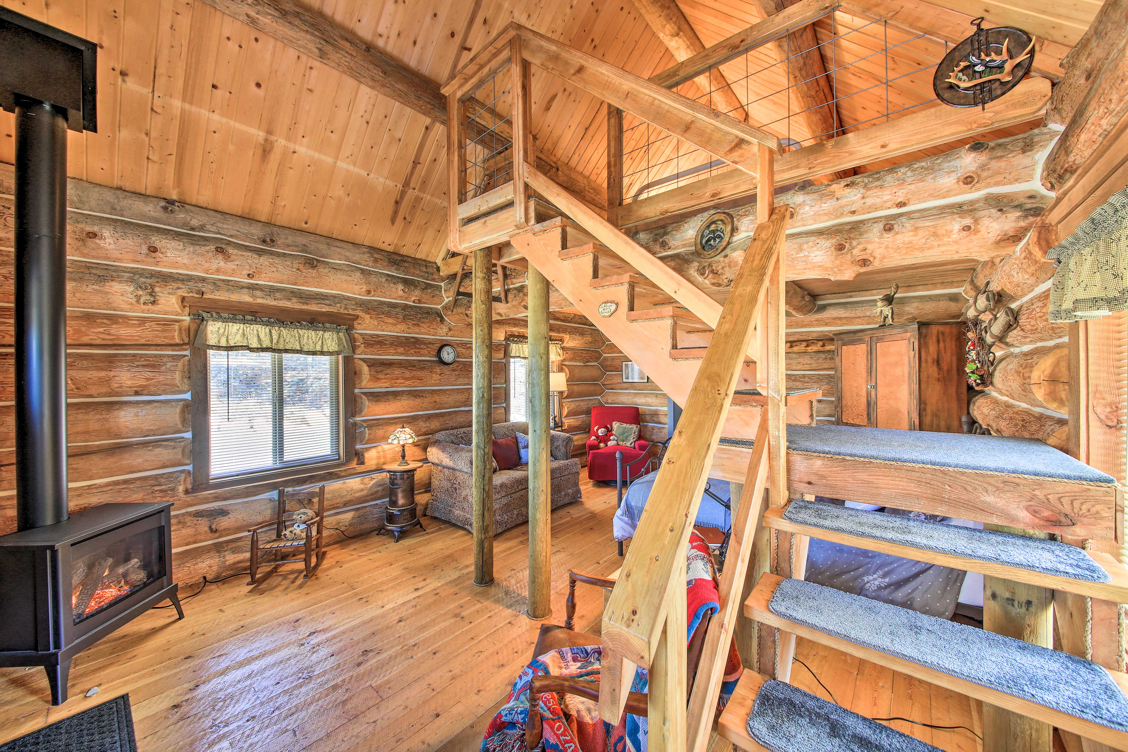 Step inside and enter the log-cabin living space.