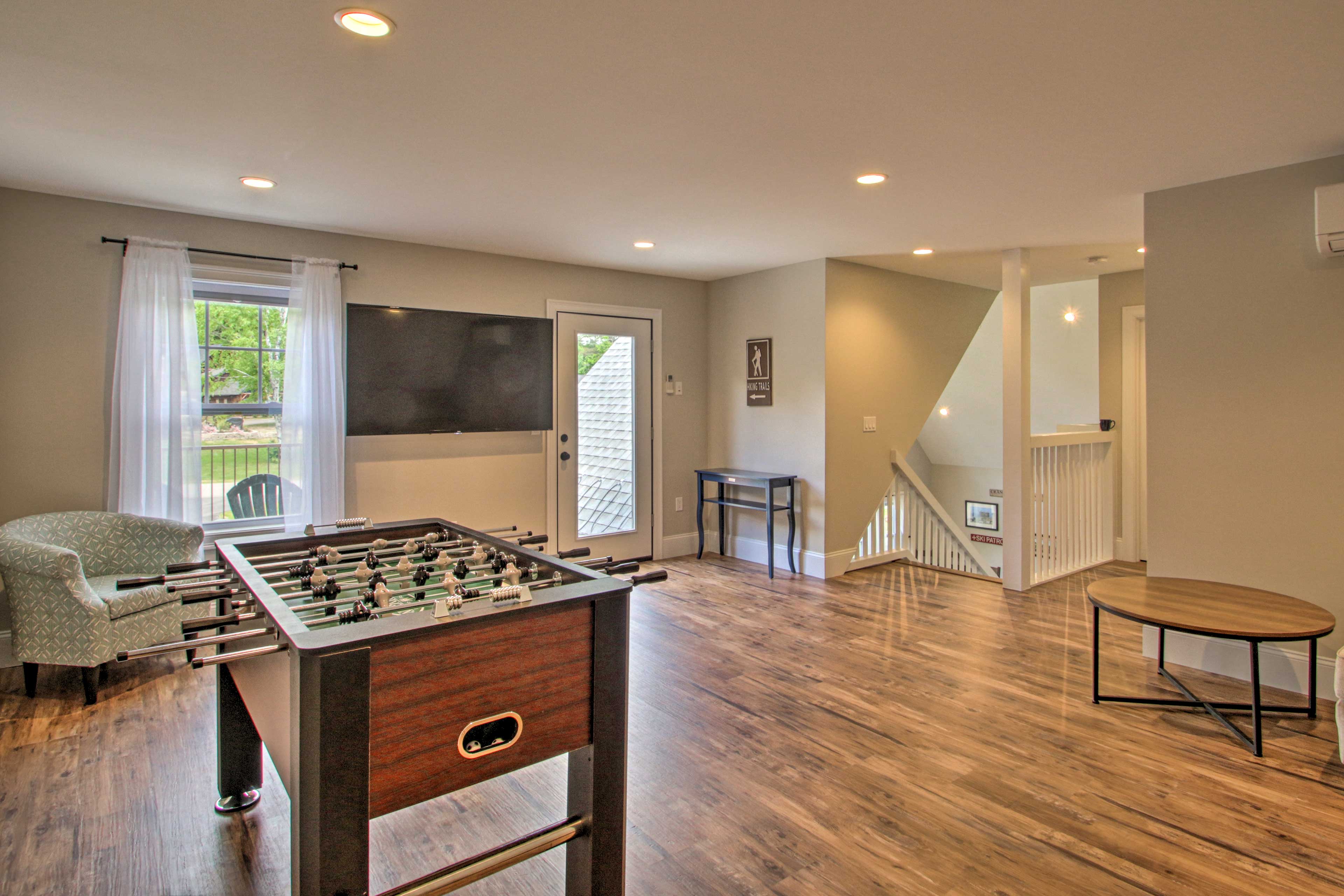 Head upstairs to the game loft, complete with foosball and a Smart TV!