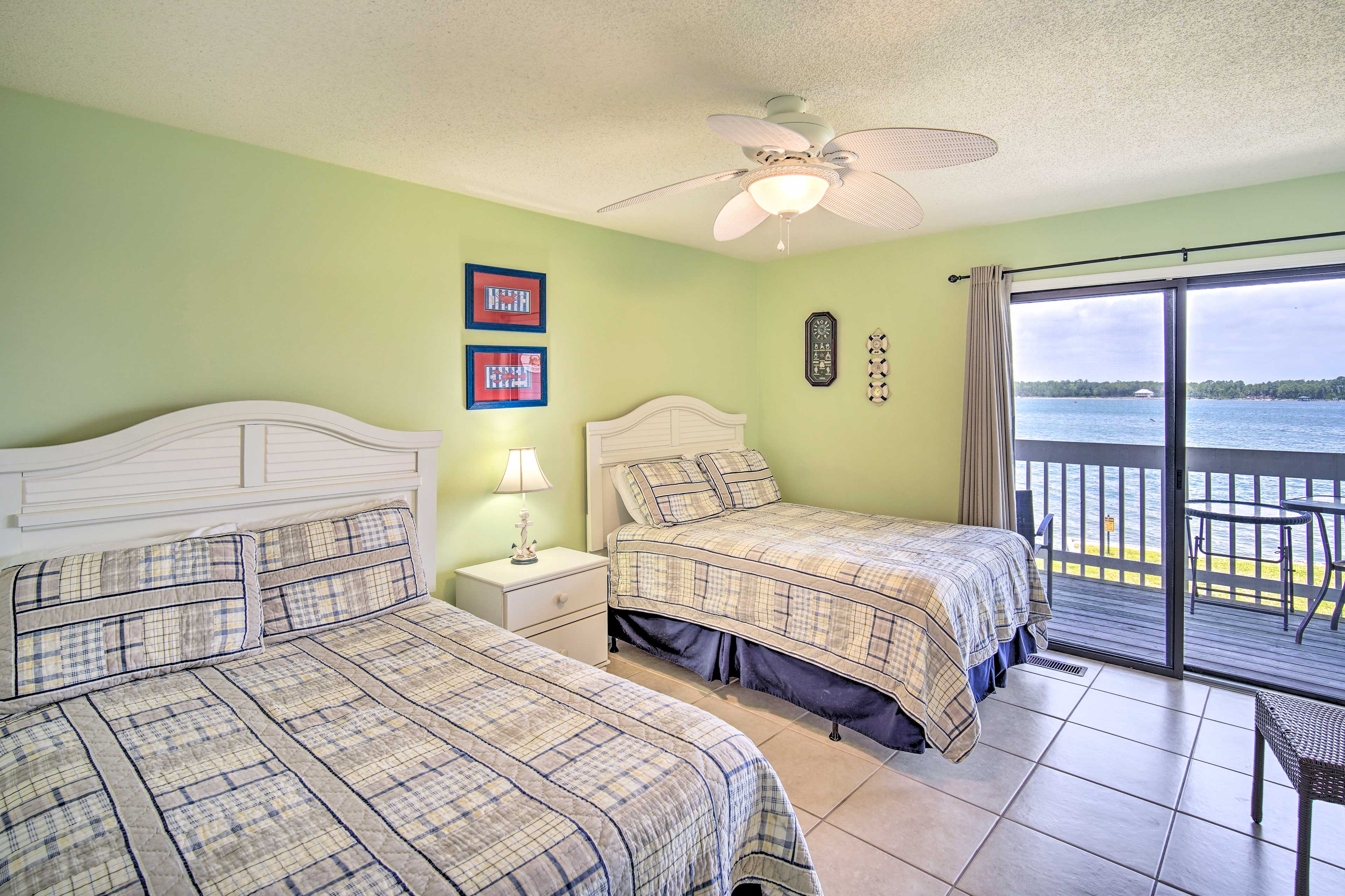 Wake up to the bay views from this bedroom.