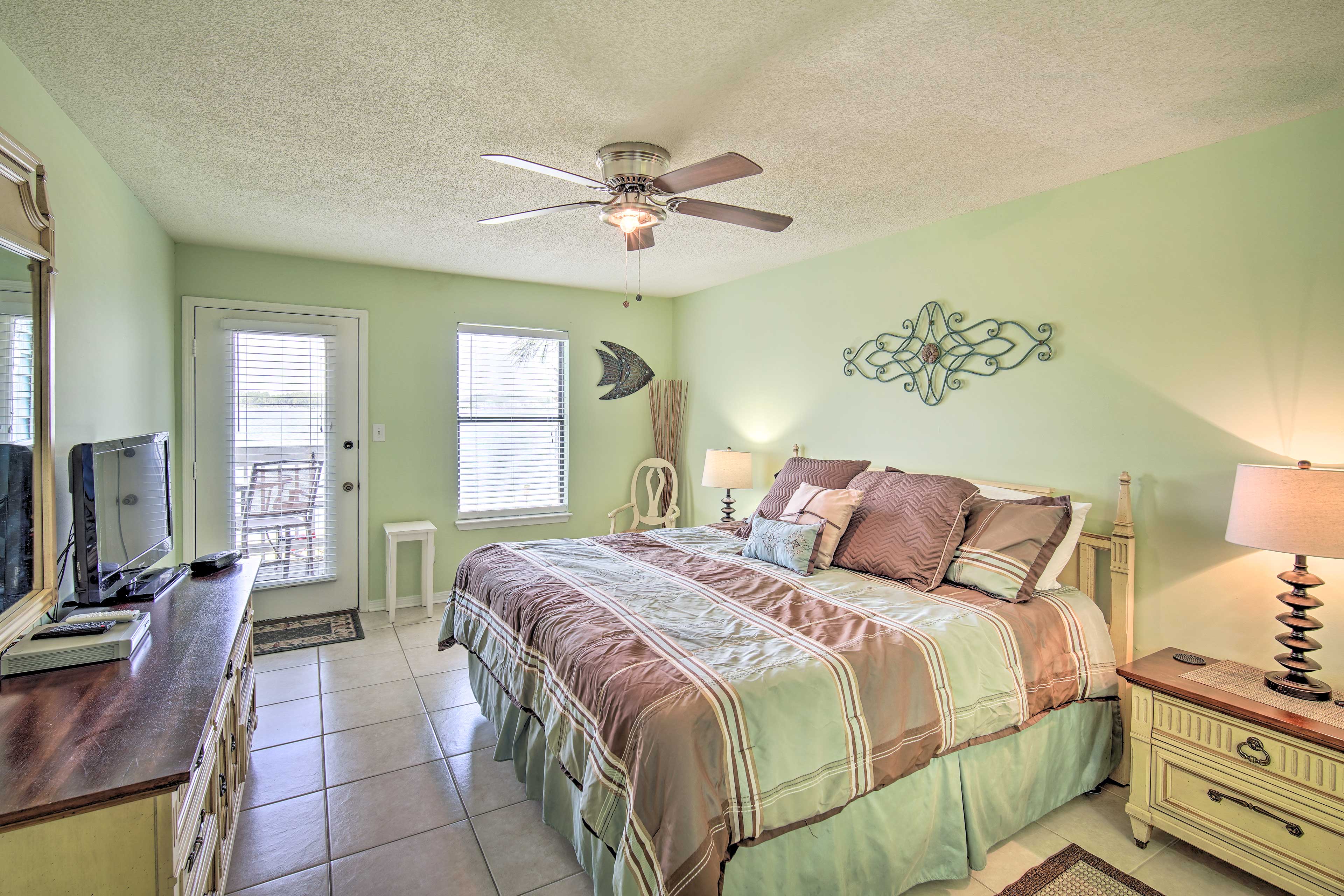 Sink into the first bedroom's king bed for a peaceful night of rest.