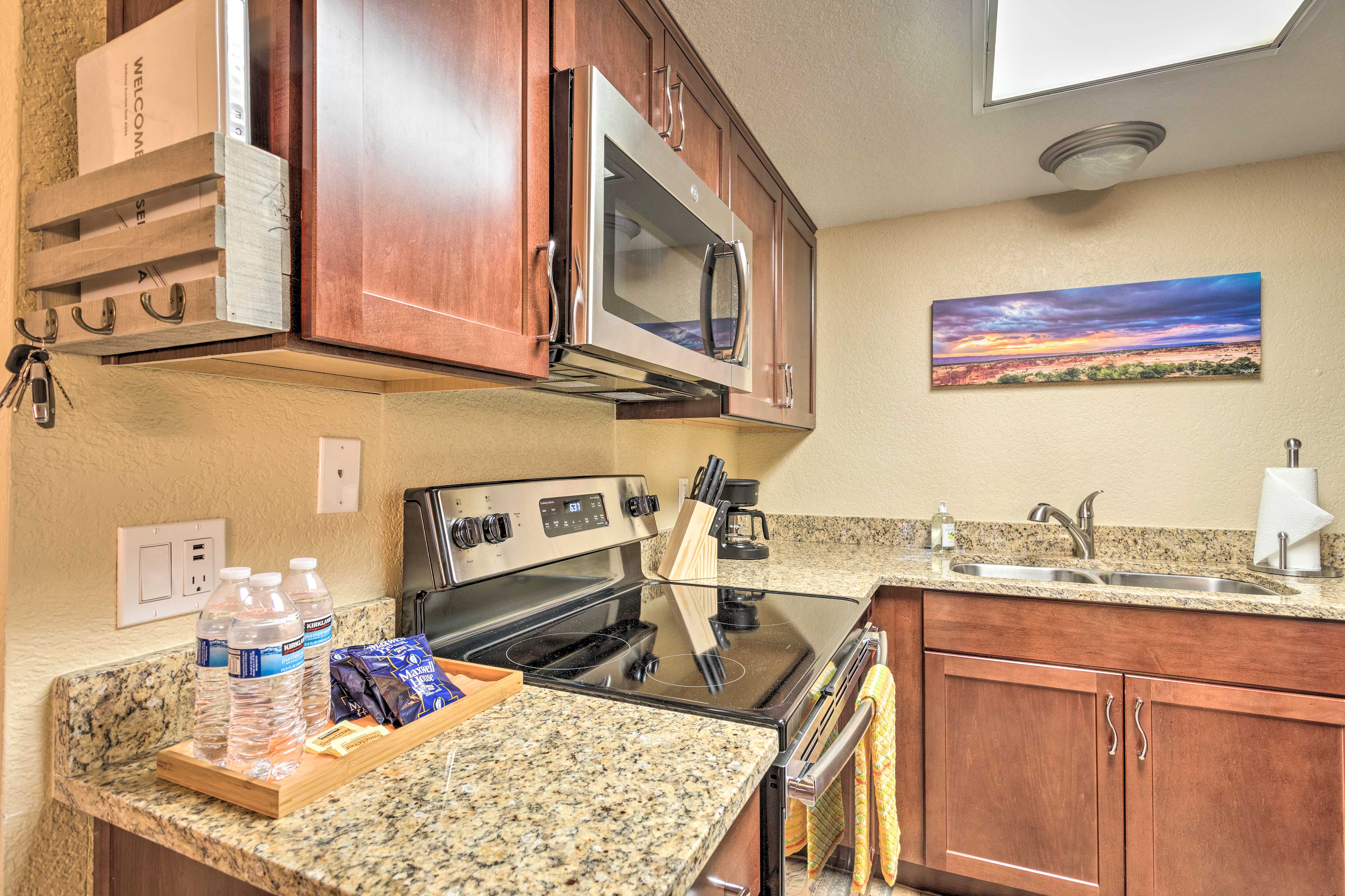 The well-equipped kitchen includes all the essential appliances.