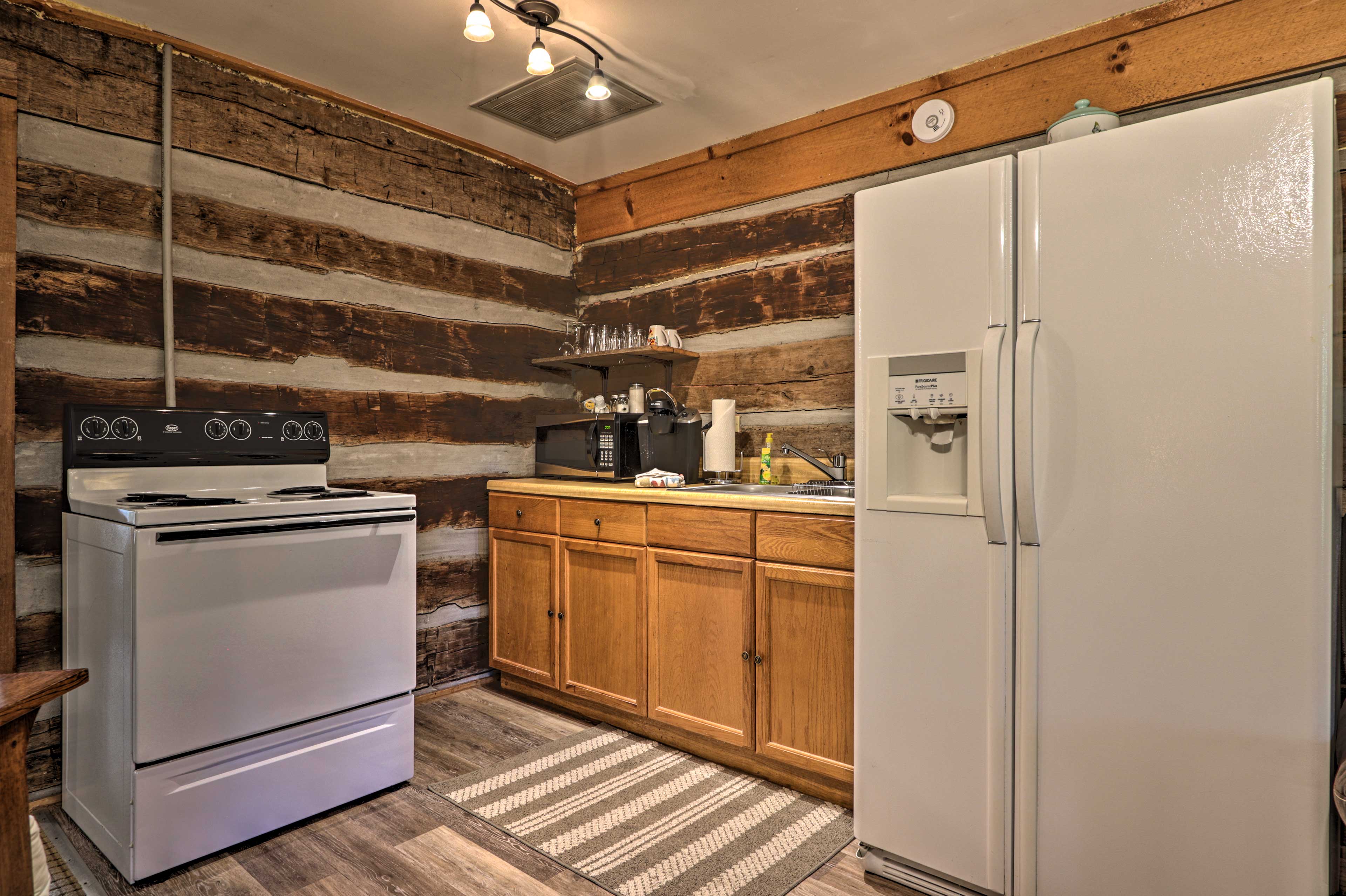 The kitchen boasts all the appliances you may need.