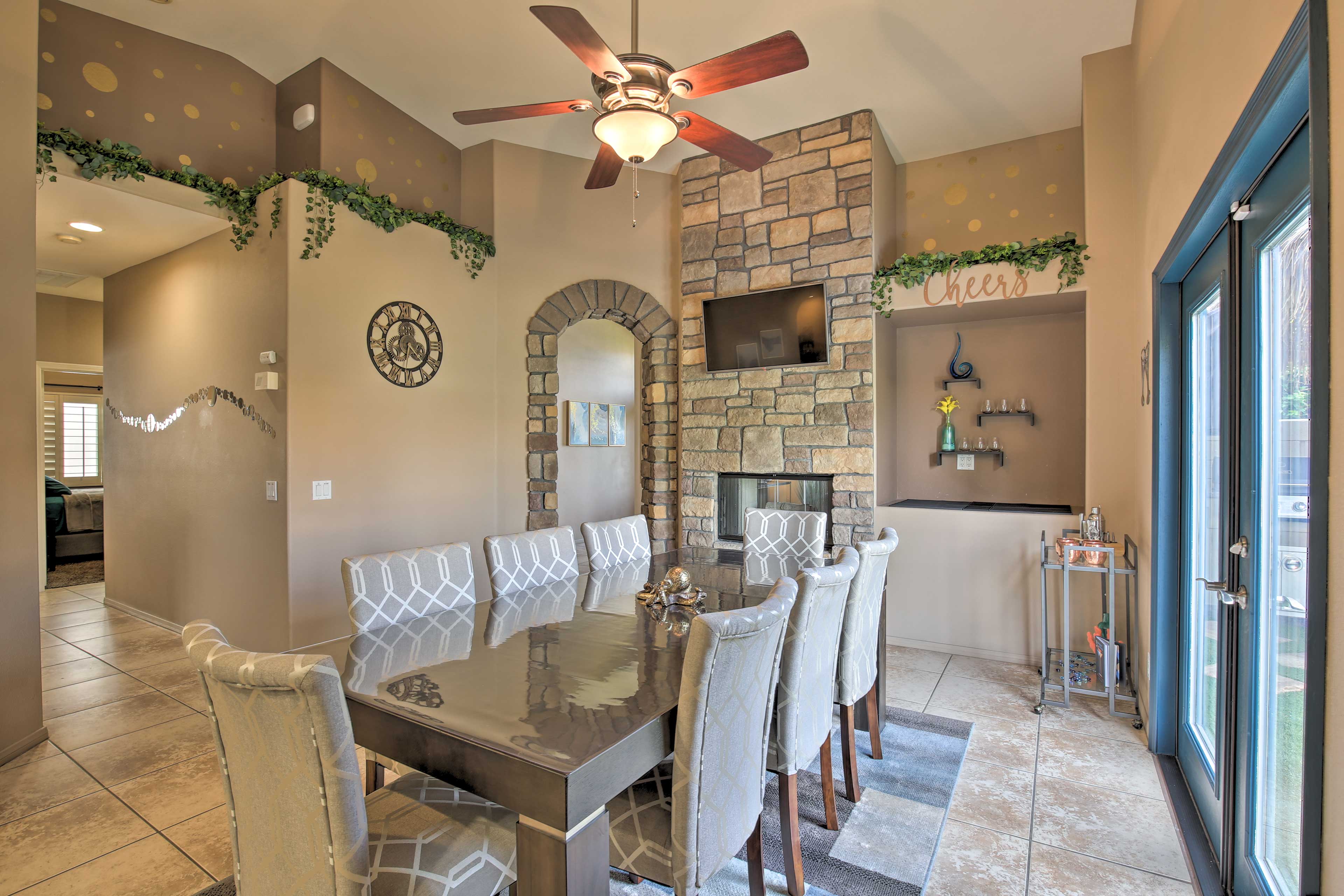 An impressive arched doorway leads to the dining room.