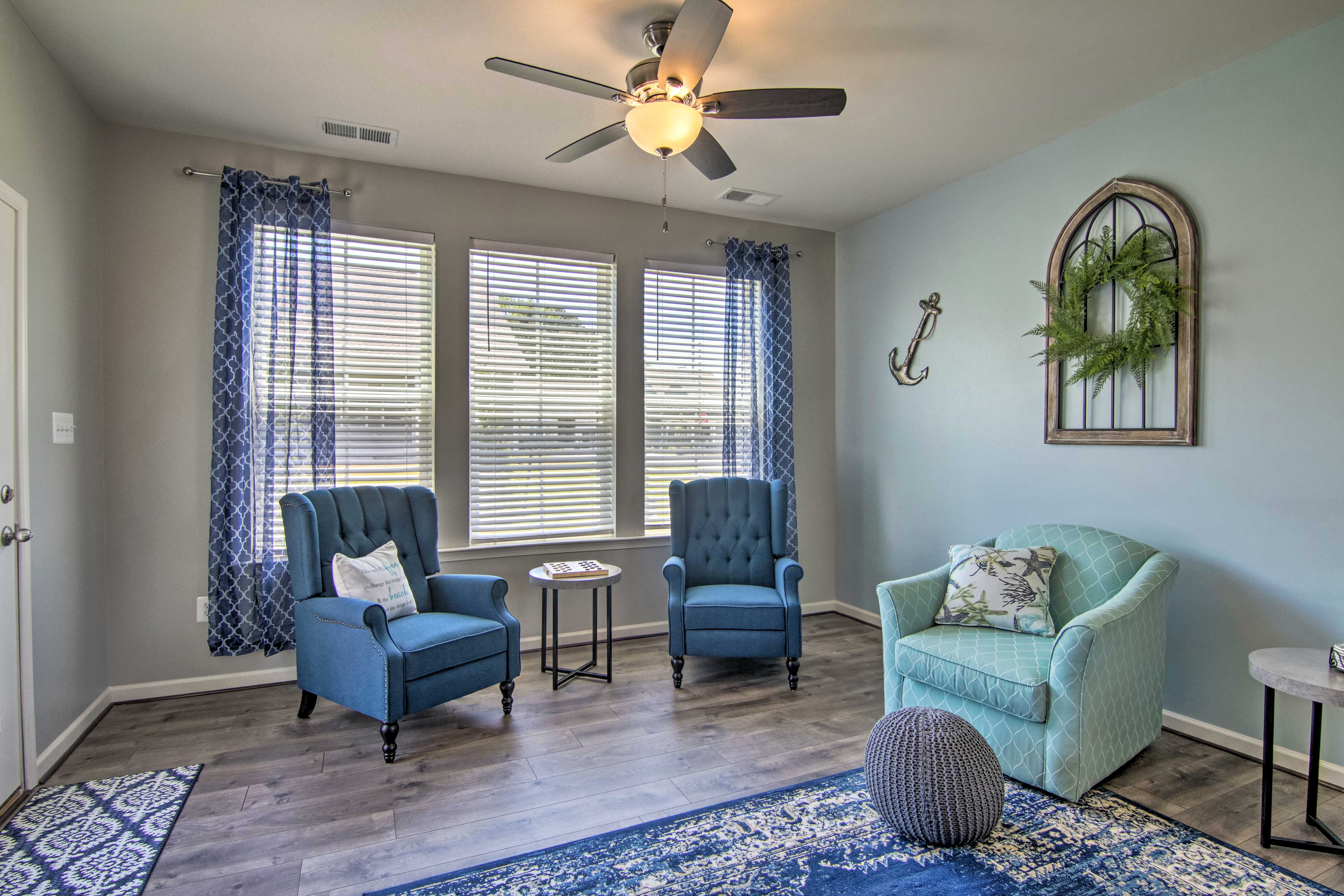 Chat with a friend in these cushy arm chairs.