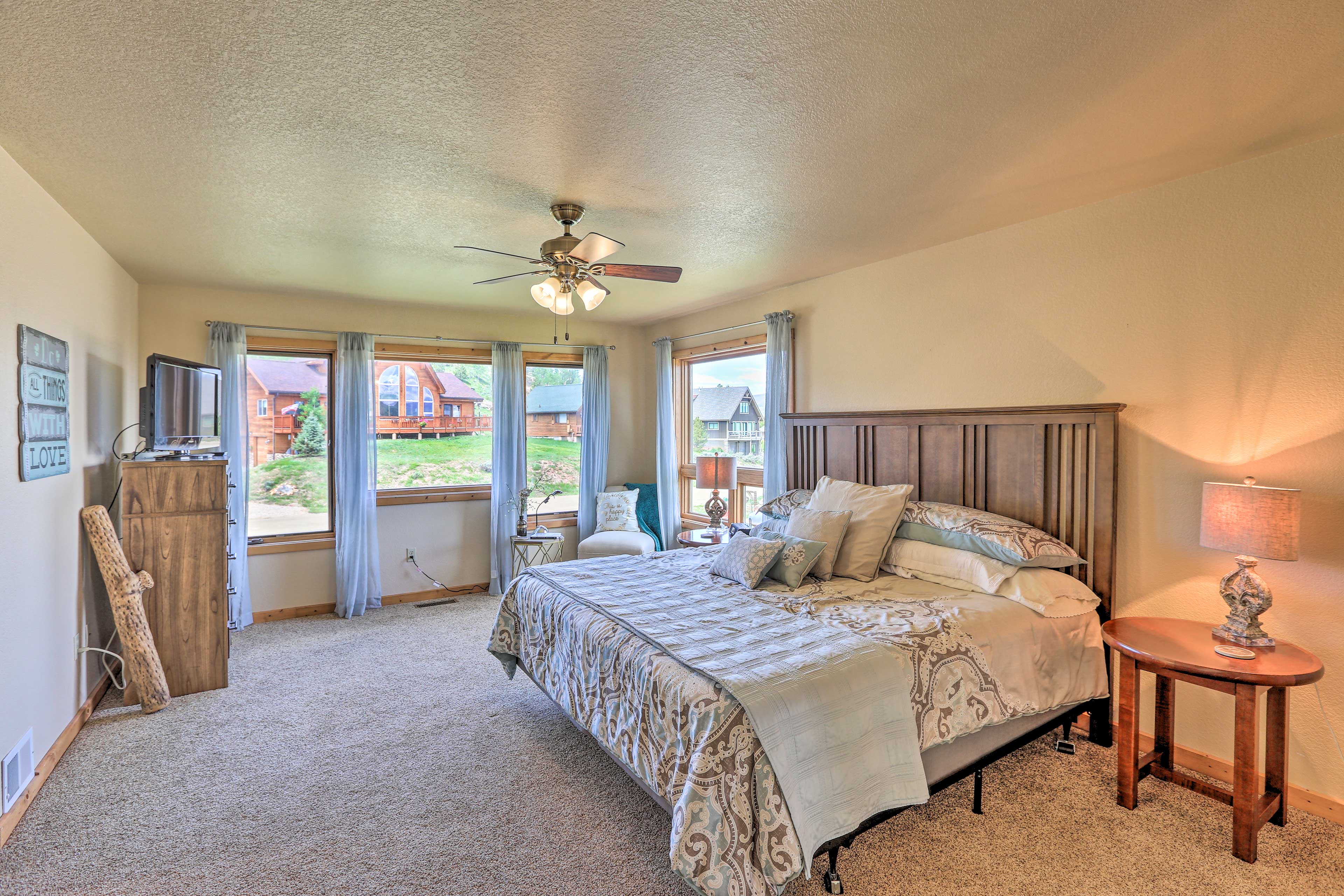 The master bedroom boasts a king bed.