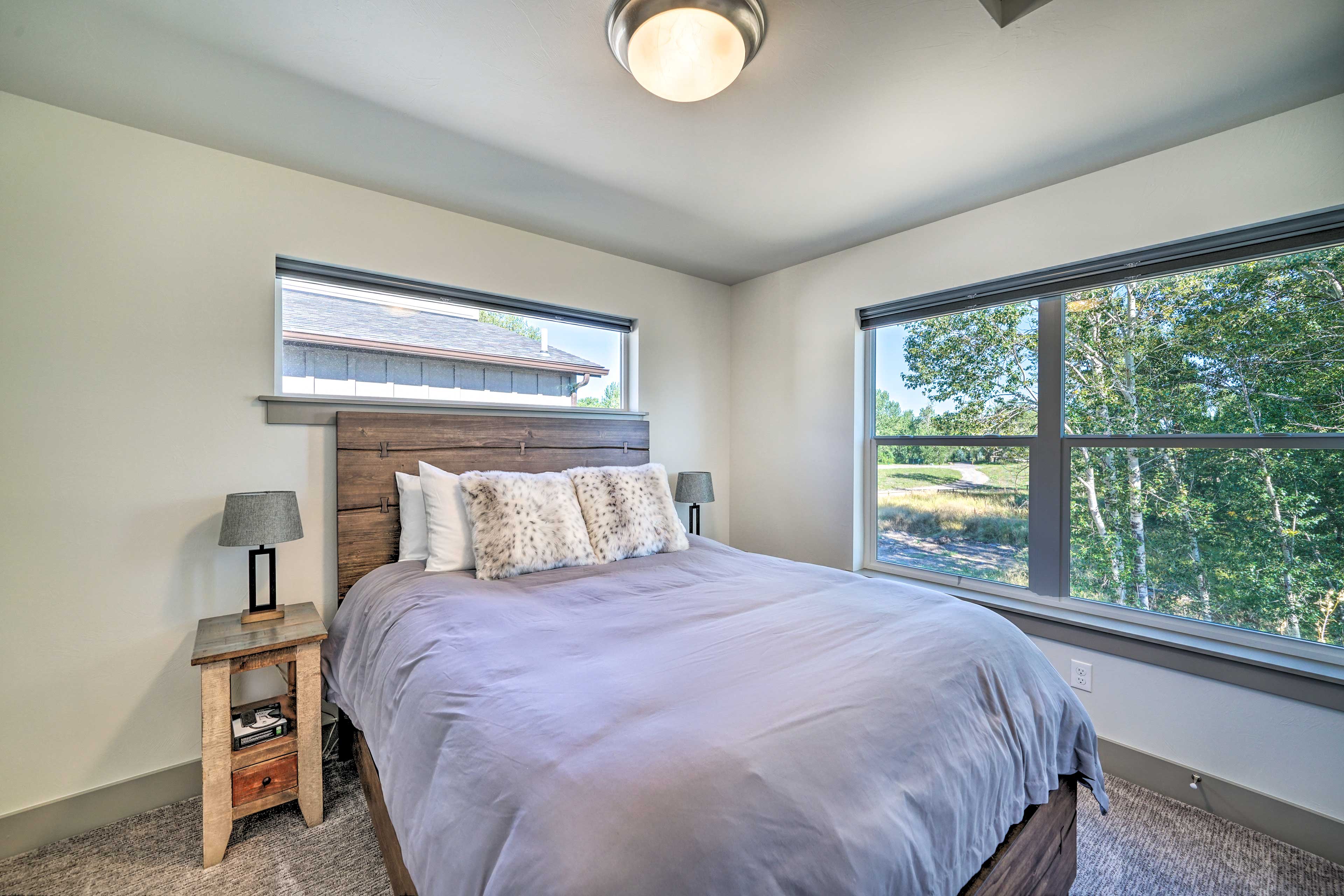 The second bedroom also hosts a queen bed.