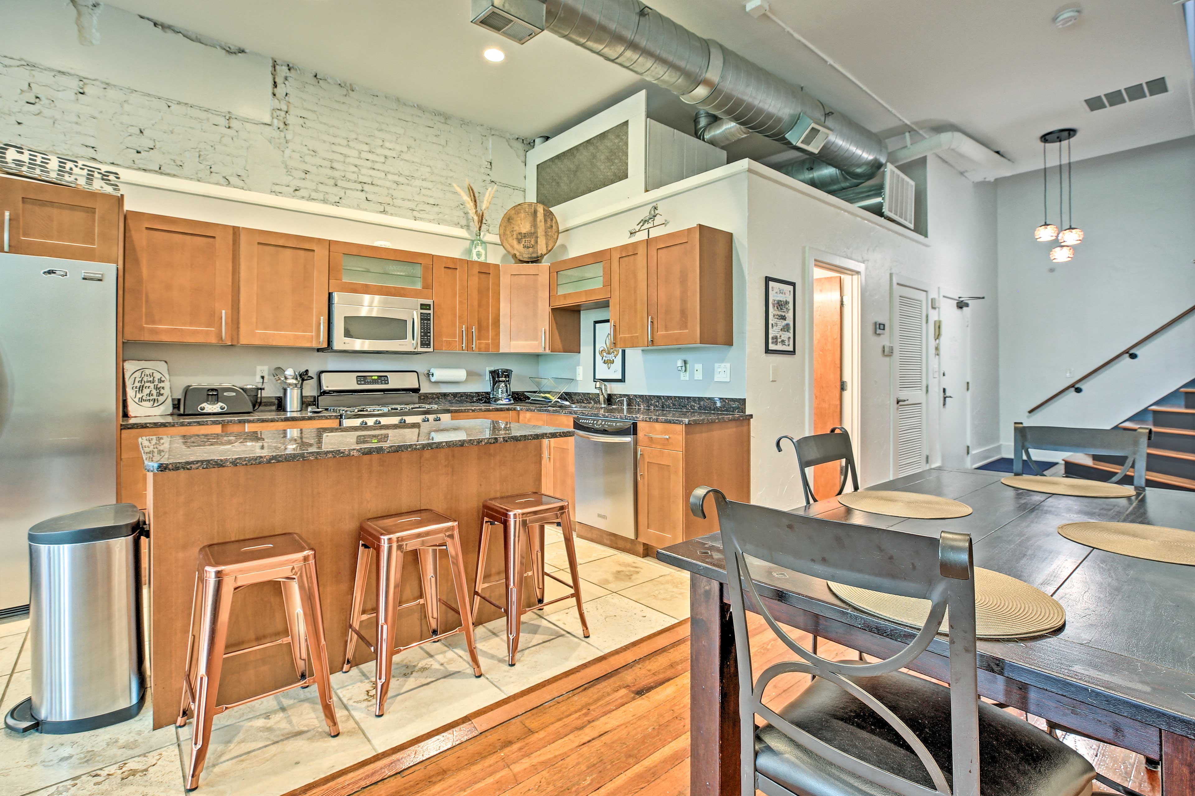 Sit at the breakfast bar as your partner cooks dinner.