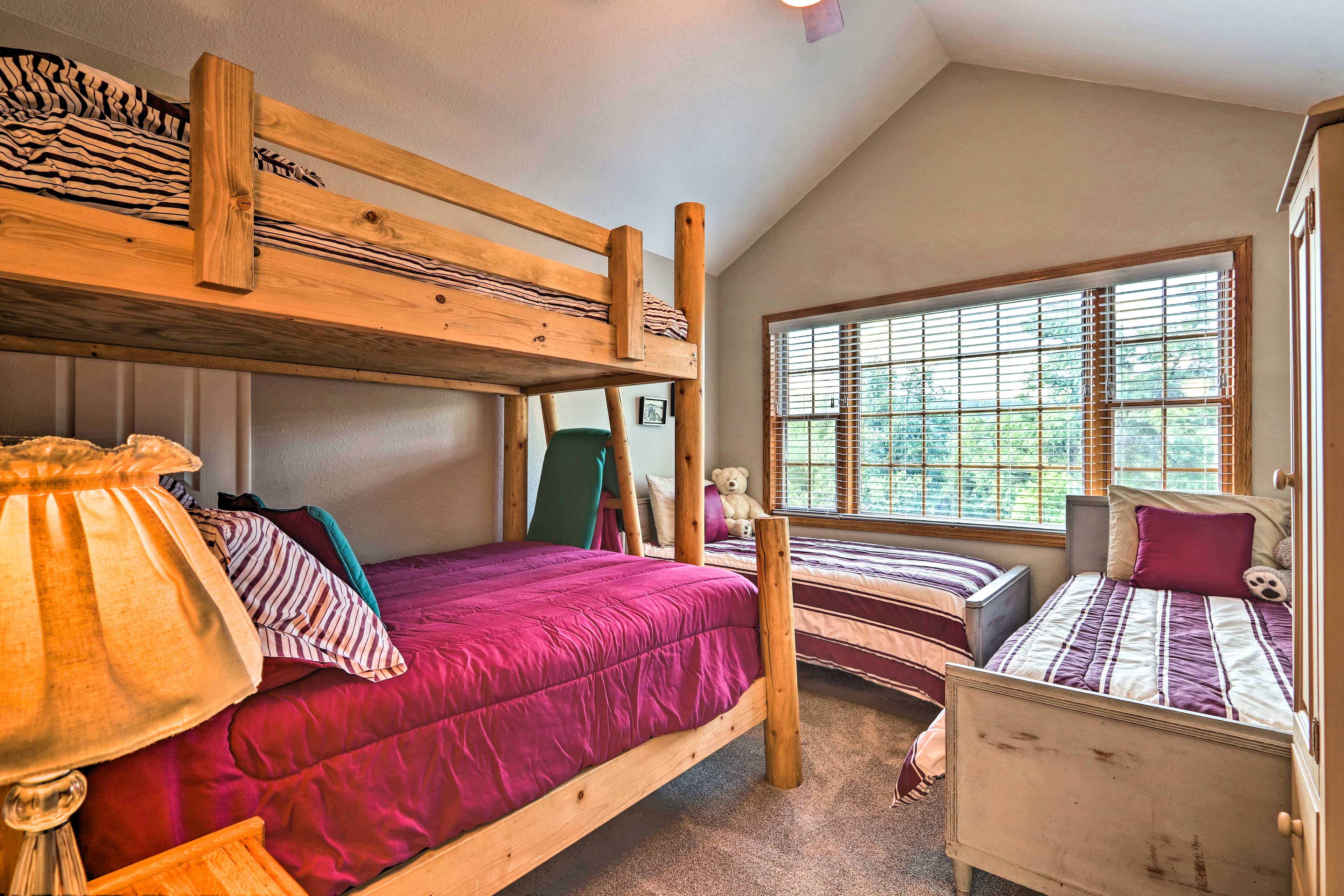 The kids are sure to love this bright and cozy bedroom!