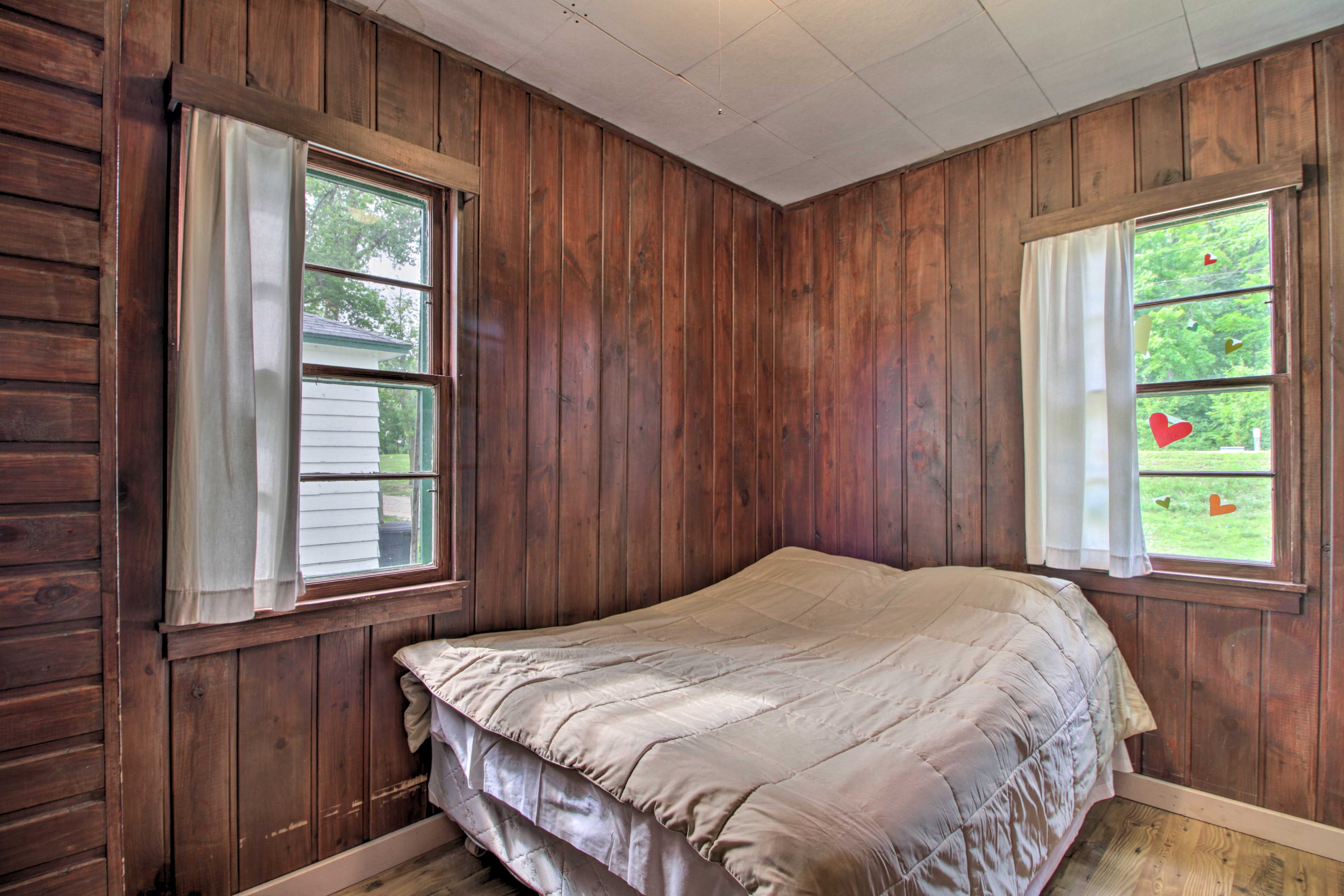 The bedroom also hosts a full-sized bed.