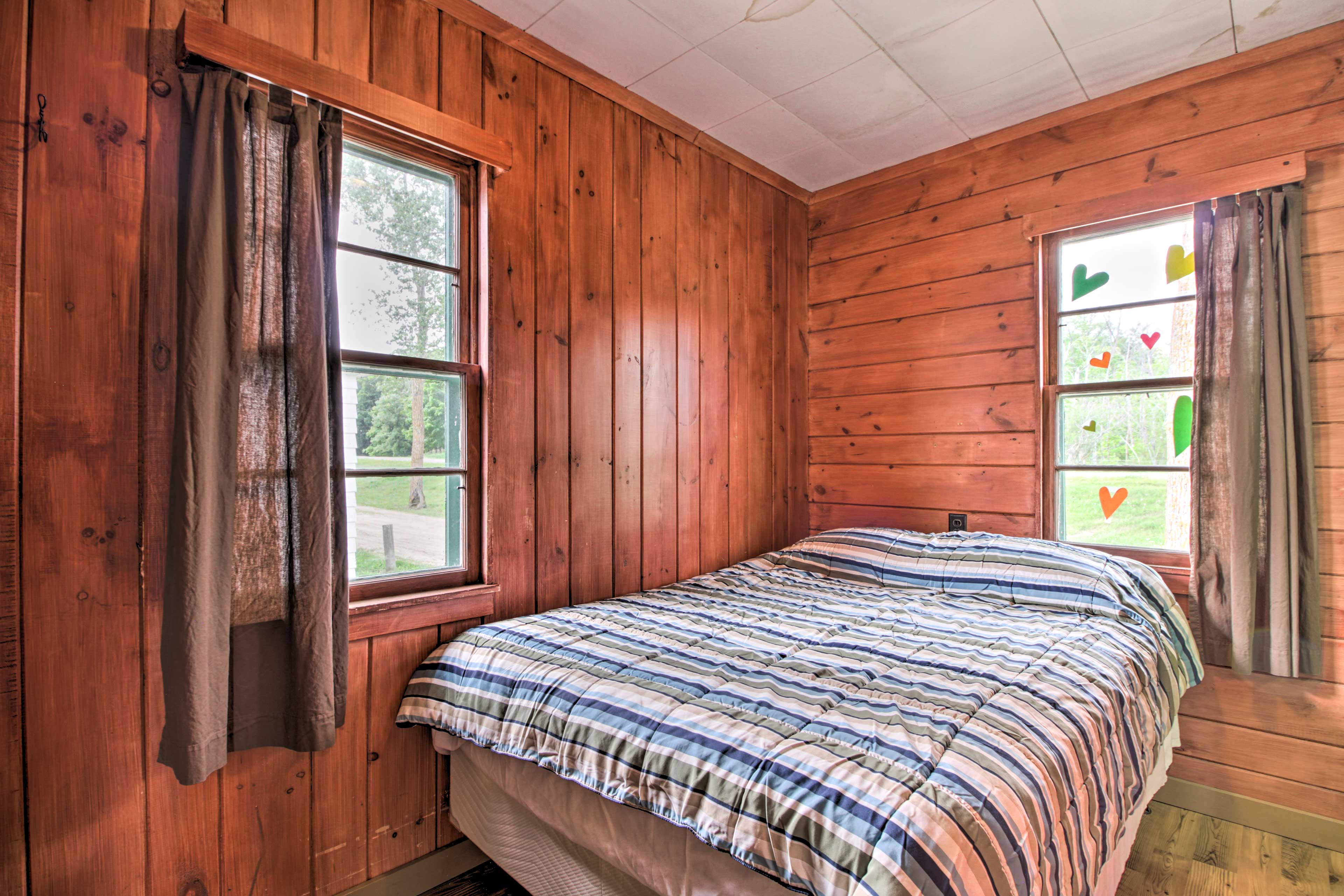 Another full bed highlights the second bedroom.