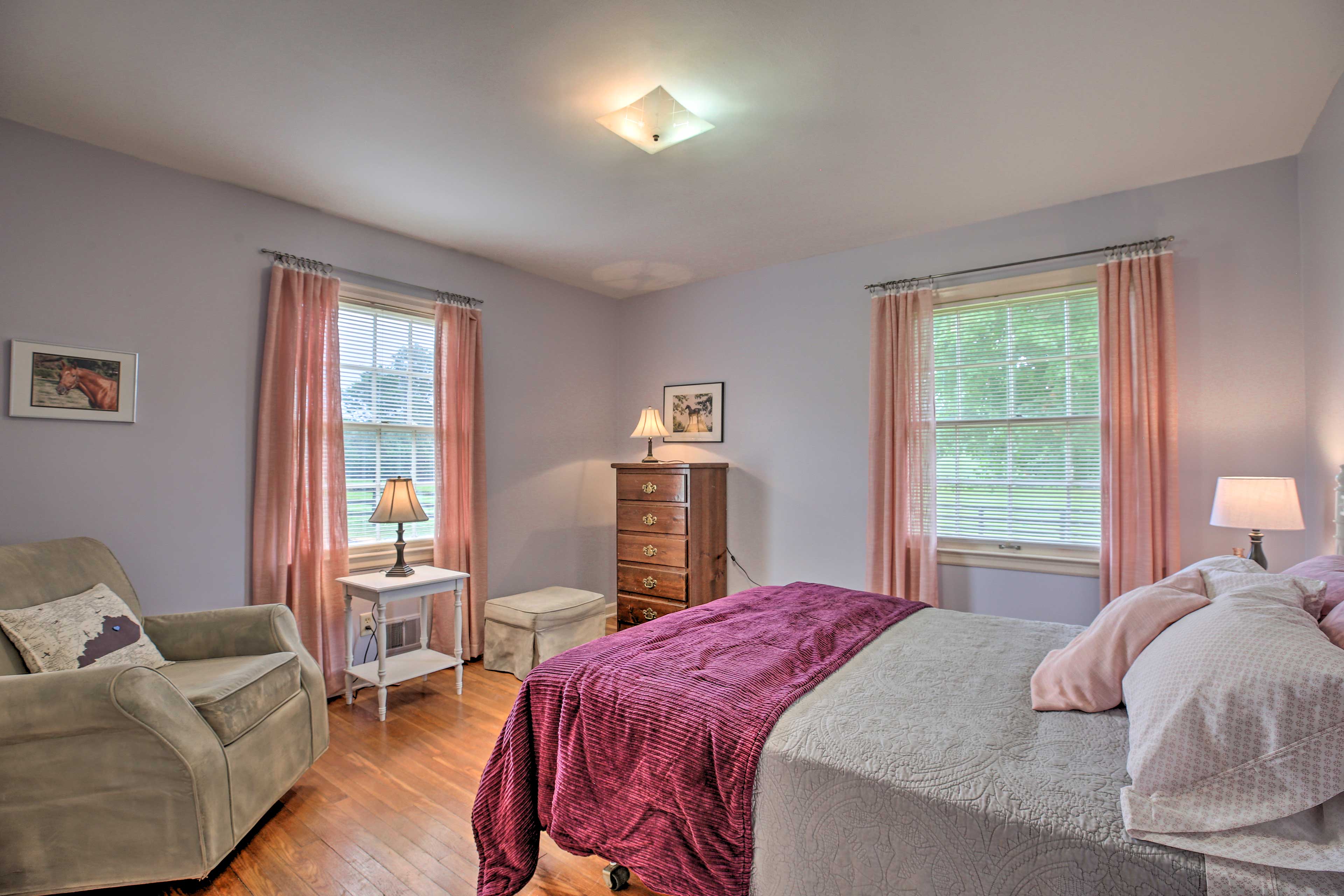 The second bedroom has a queen-sized bed.