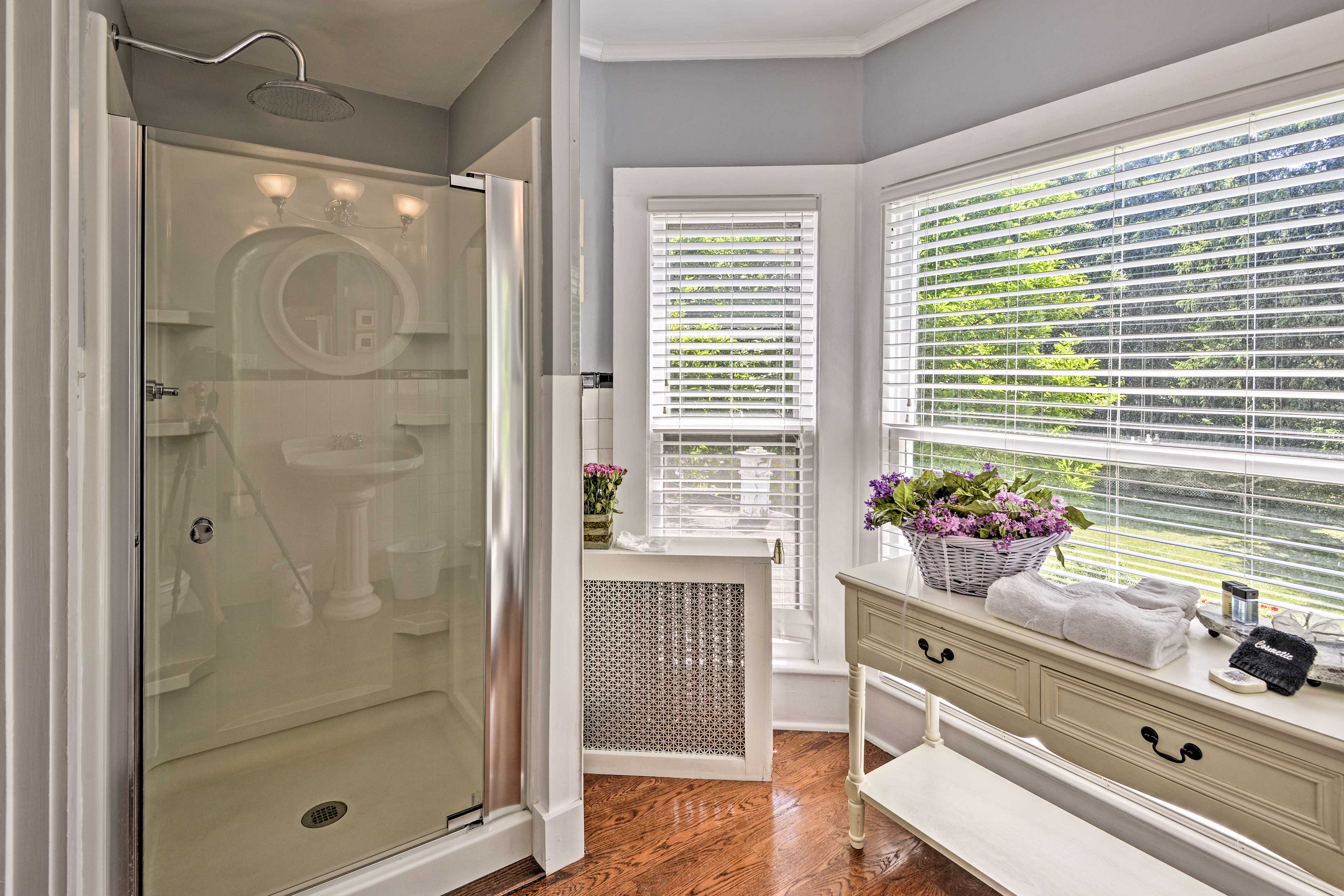 Rinse off in the walk-in rain head shower.