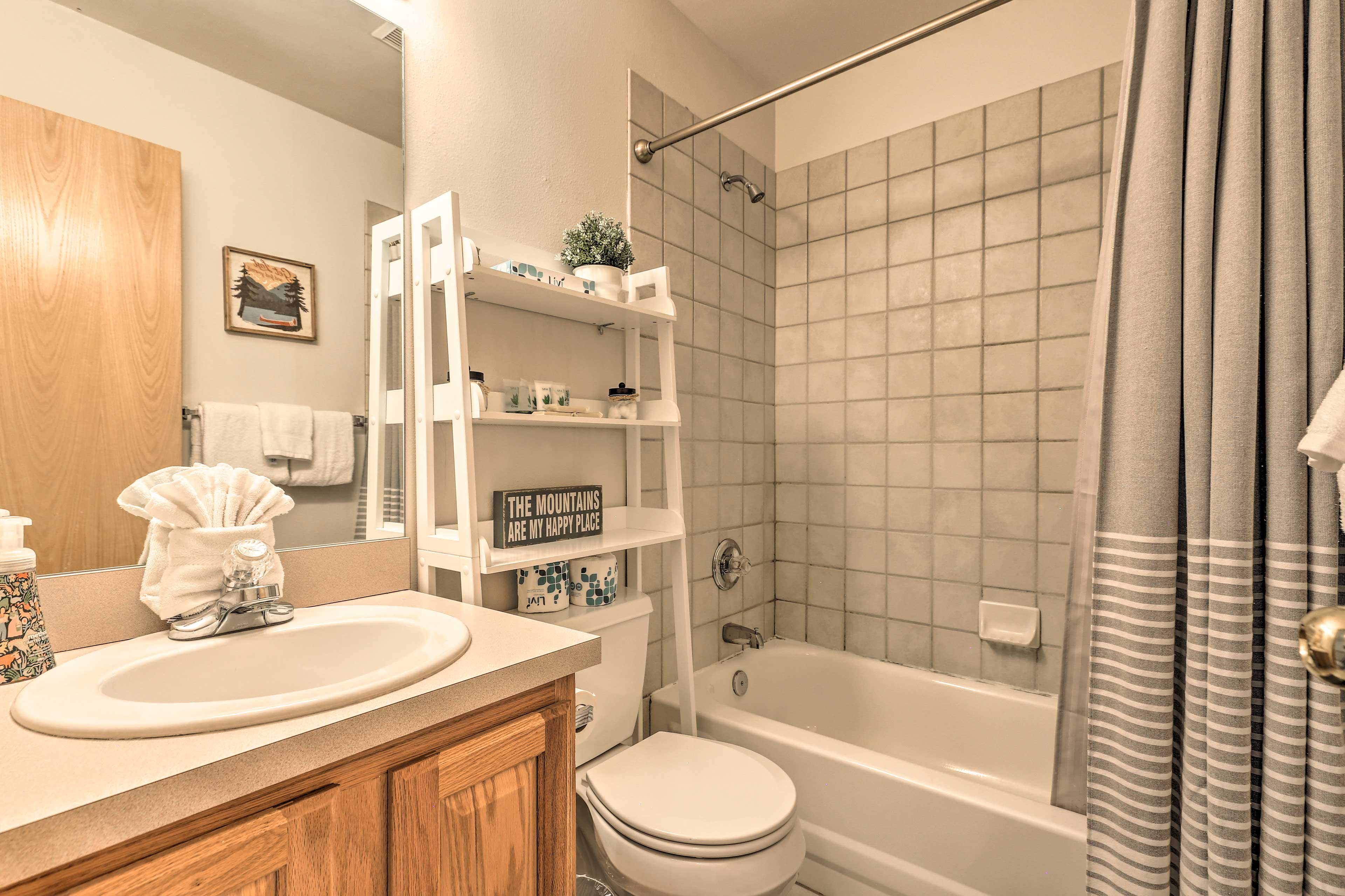 Get ready for the day in this full bathroom.