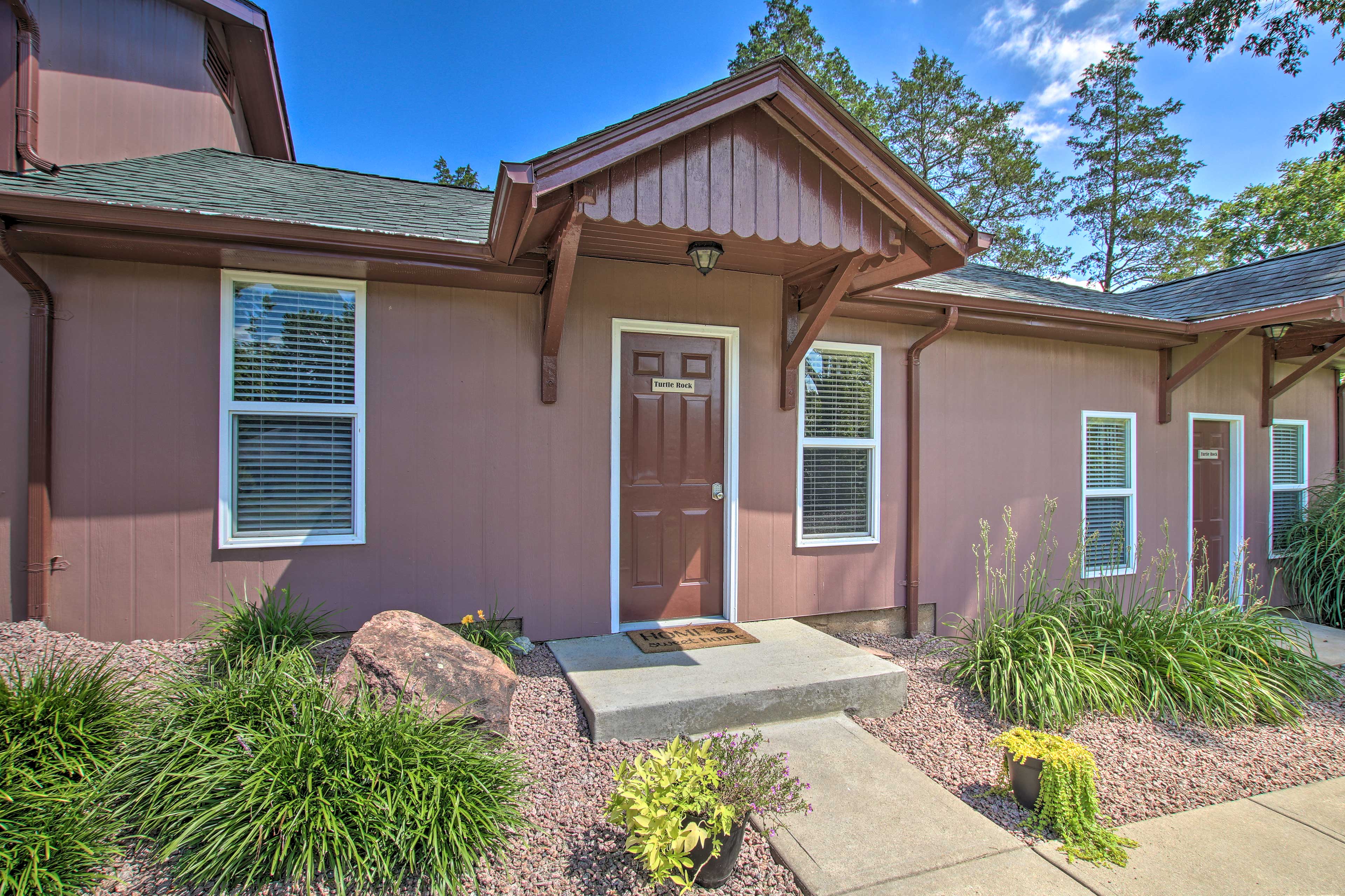 The charming 1-bedroom, 1-bathroom retreat has its own outdoor seating area.