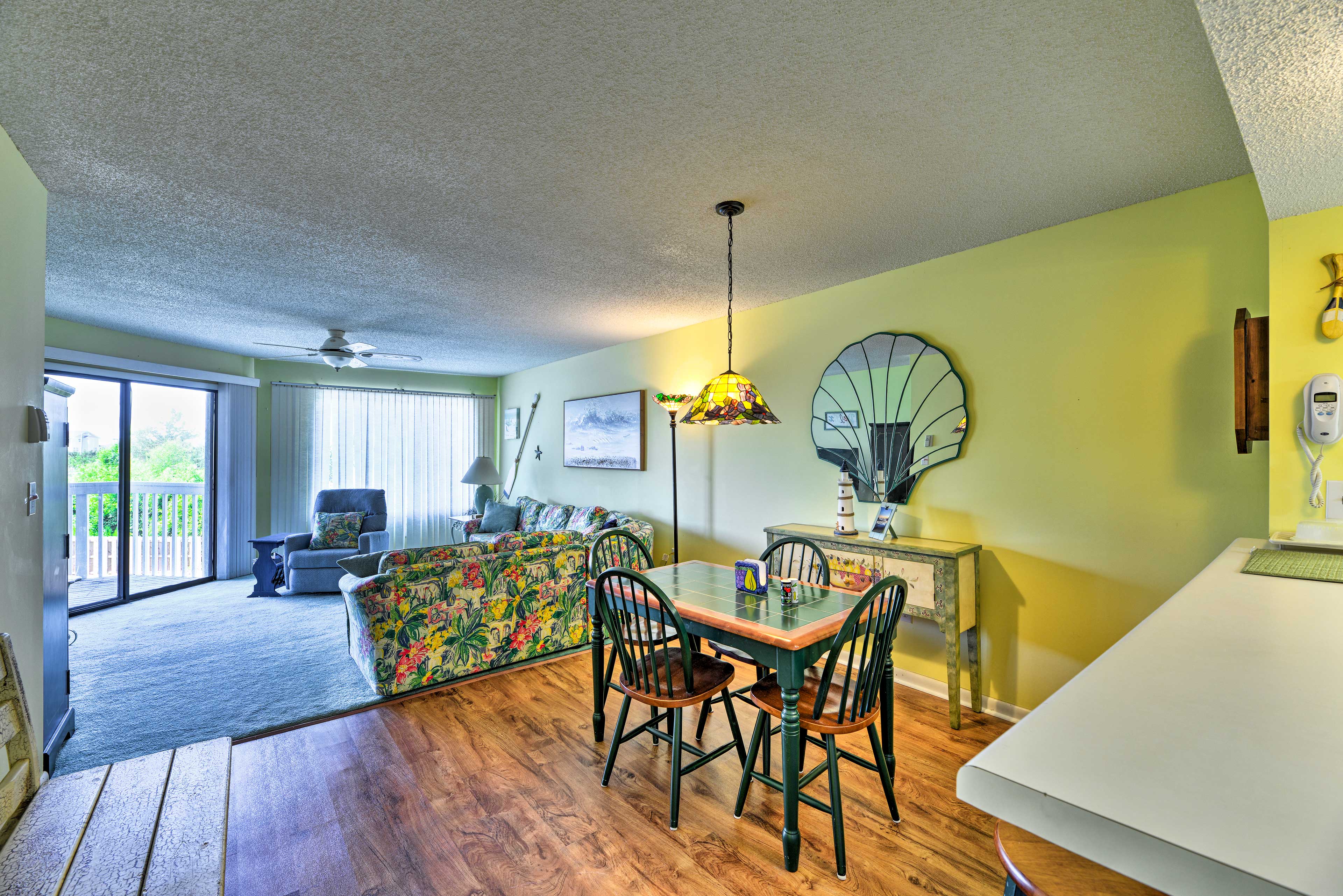 Enjoy a bite to eat at the 4-person dining table.