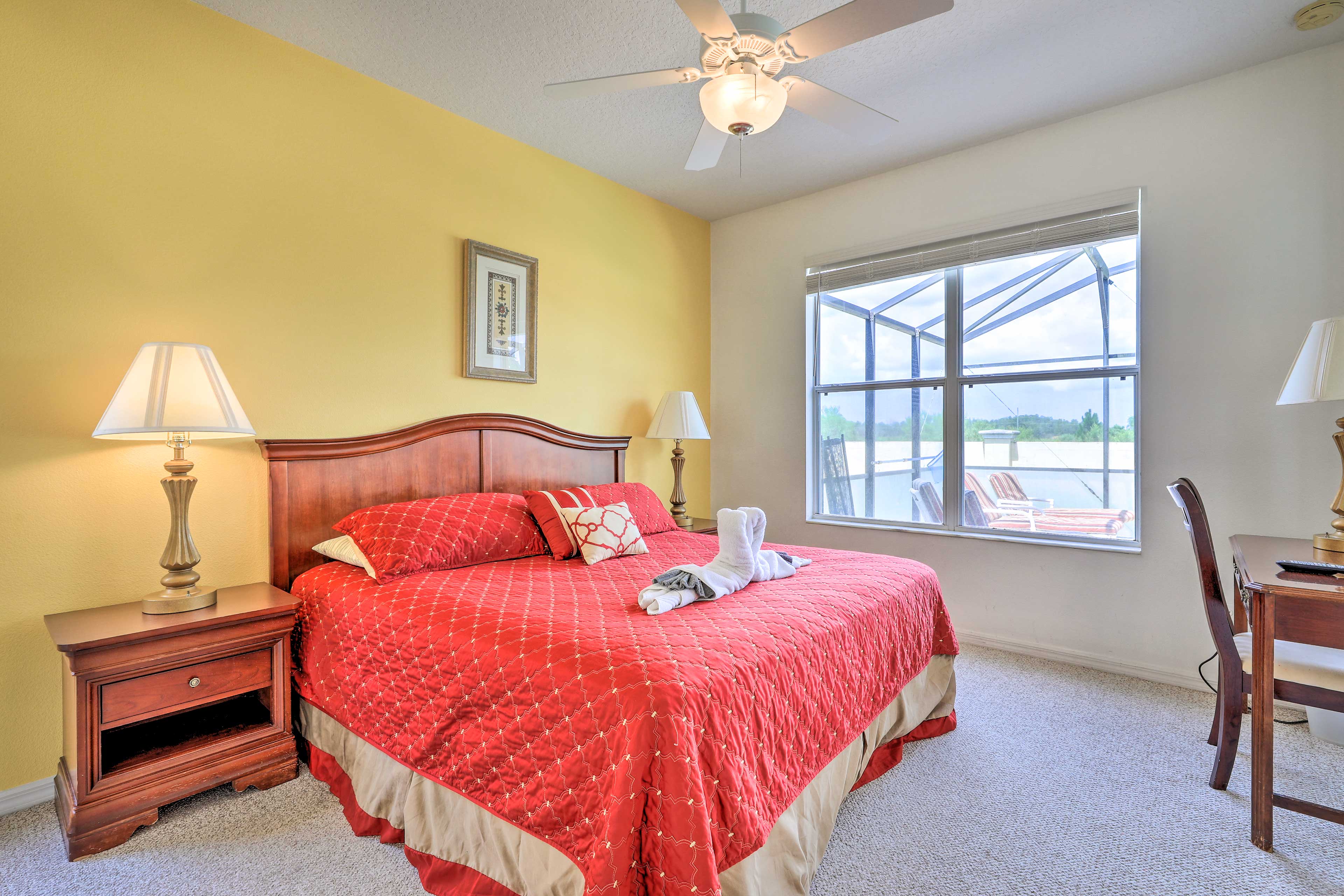 This bedroom boasts a king bed and en-suite bath.