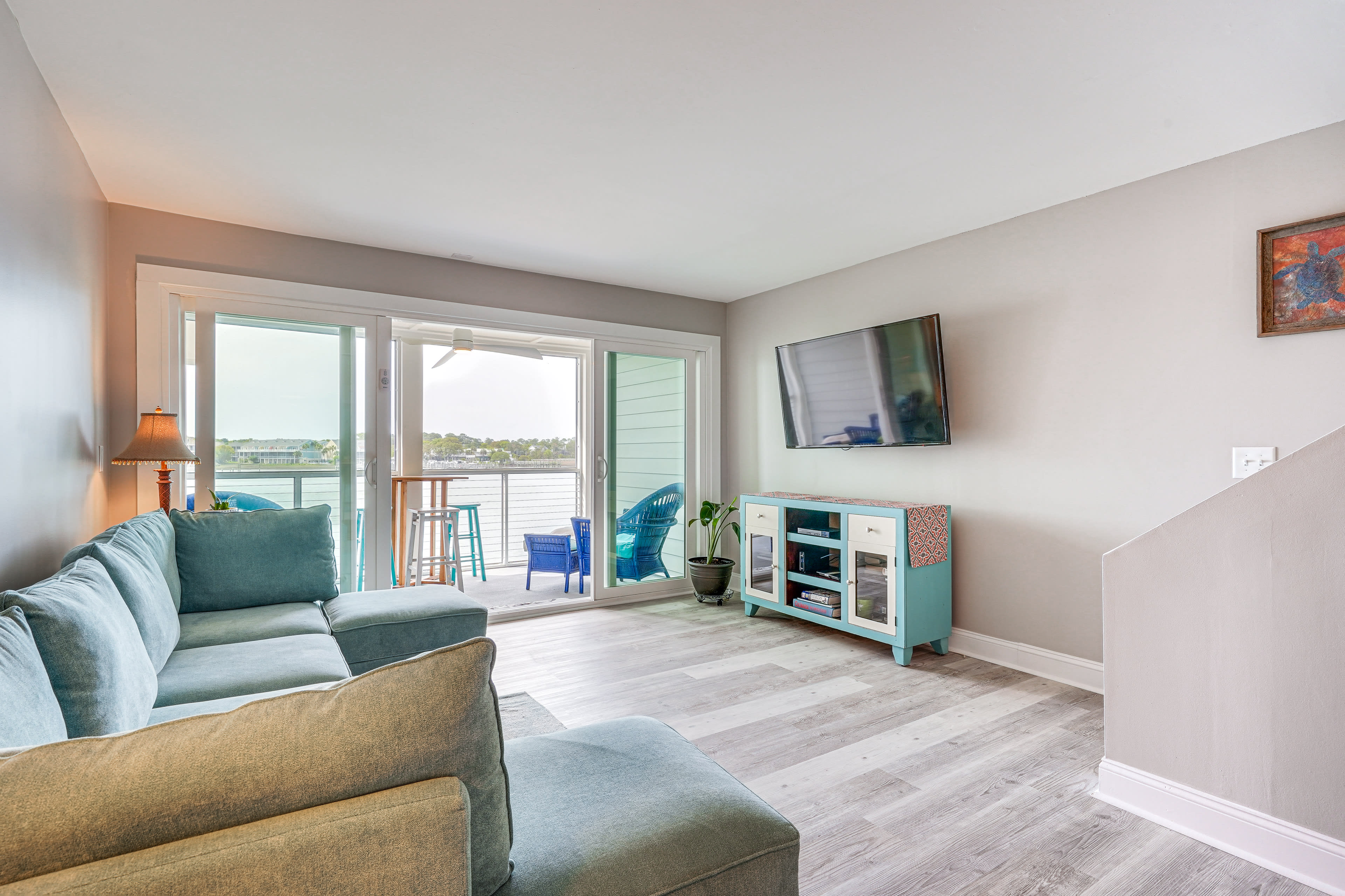 Living Room | 1st Floor | Smart TV | Natural Light | Laminate Floors