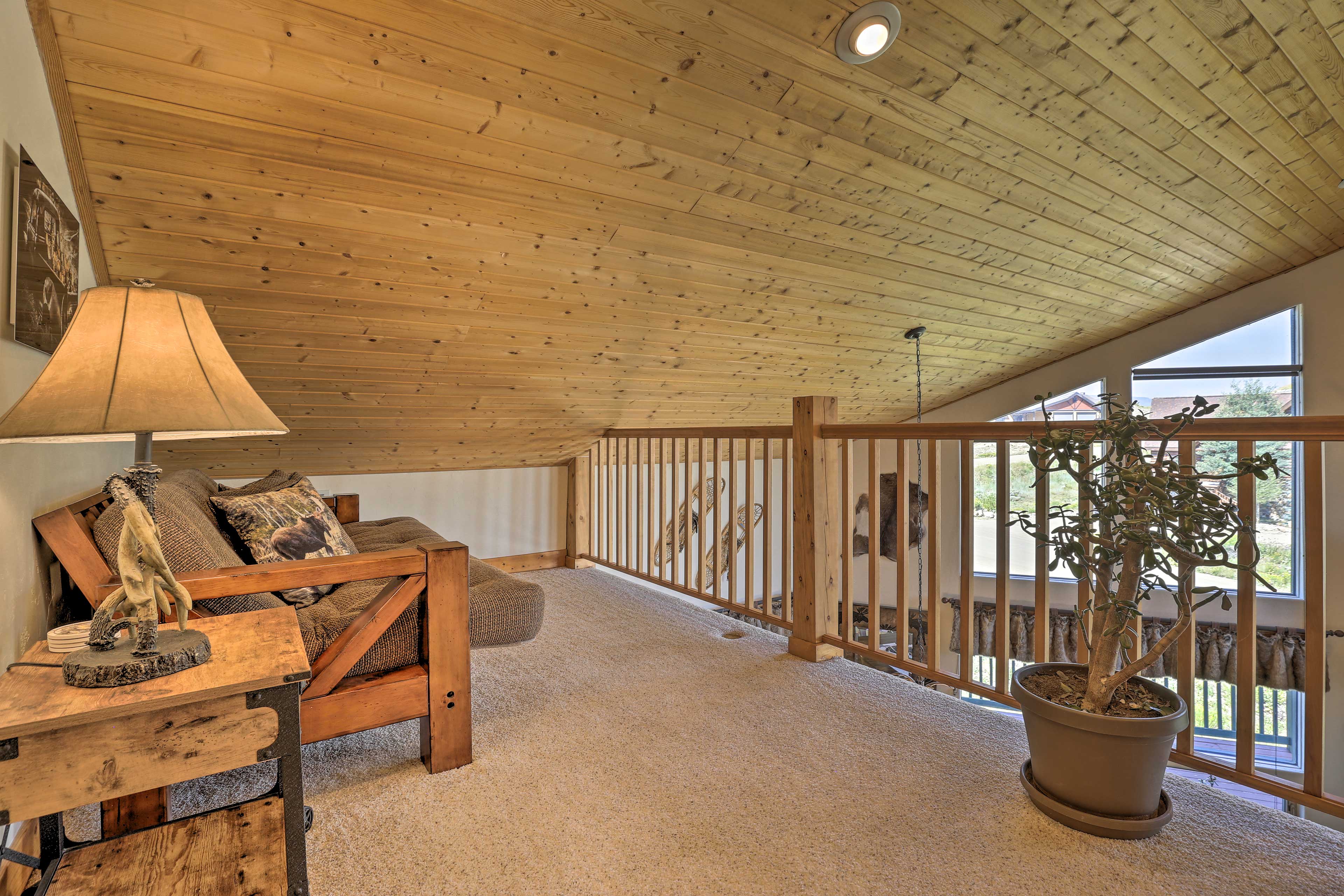 Upstairs the loft is home to a sleeper sofa.