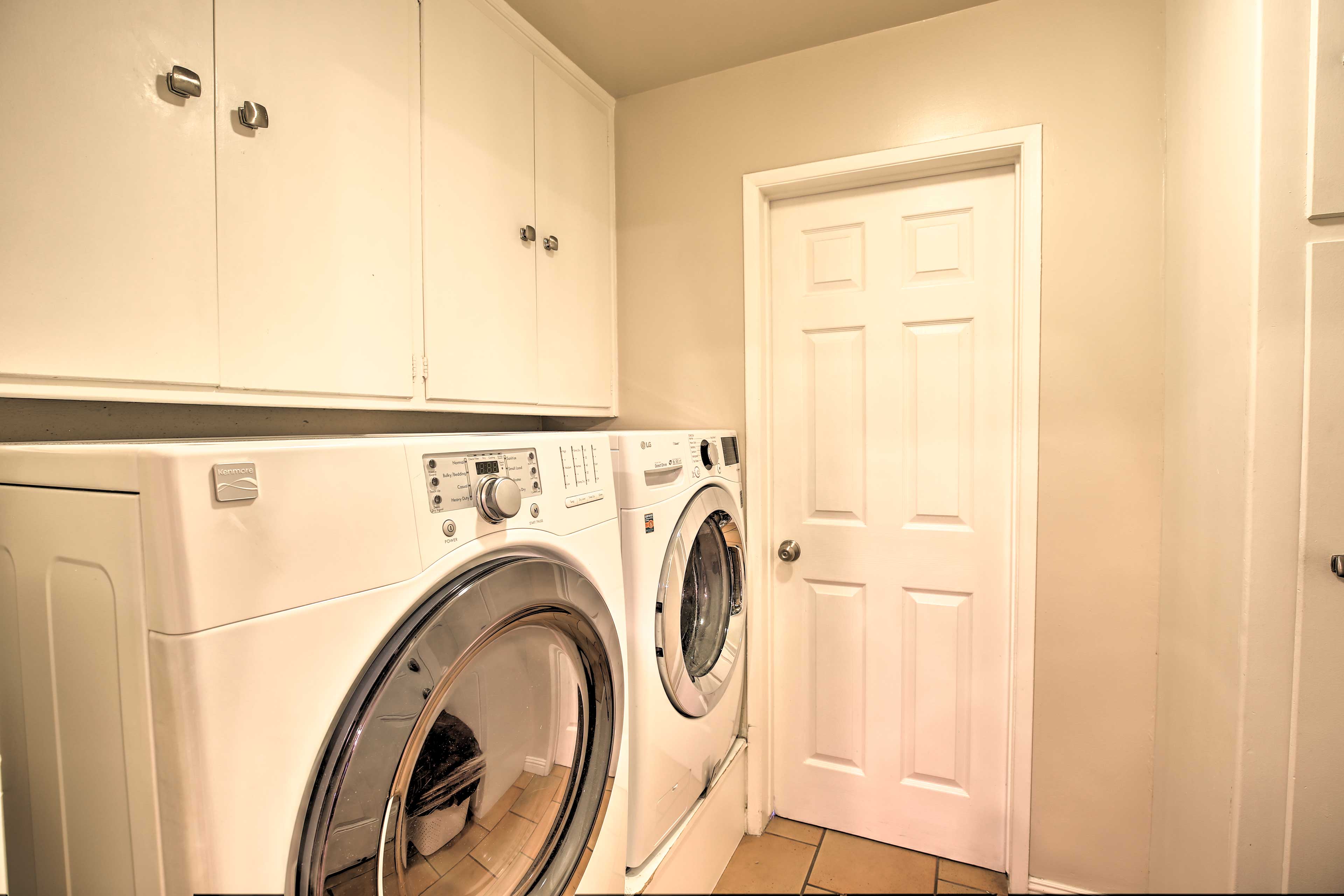 Keep your wardrobe fresh with the home's laundry machines.