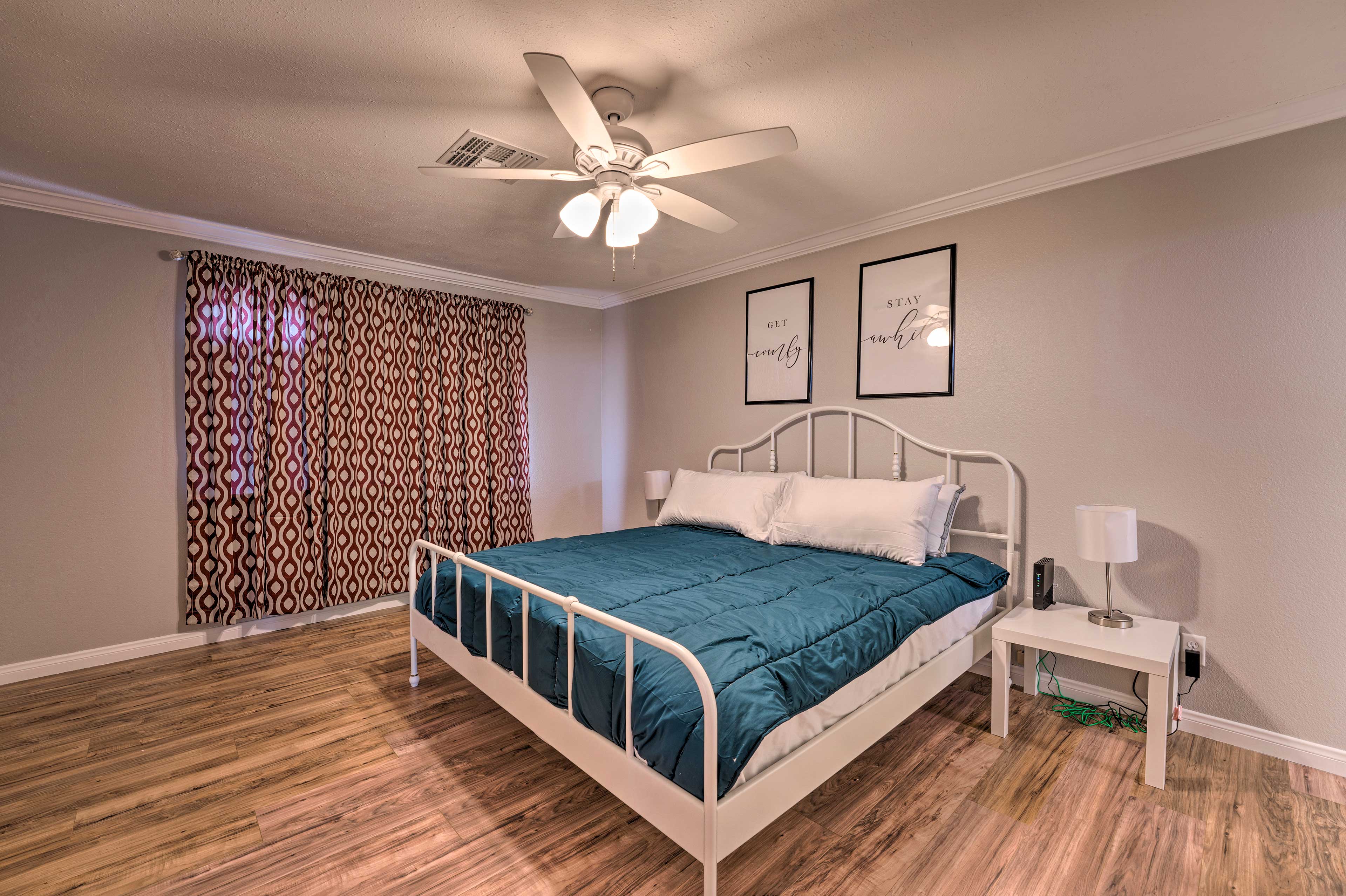 The master bedroom boasts a king bed.