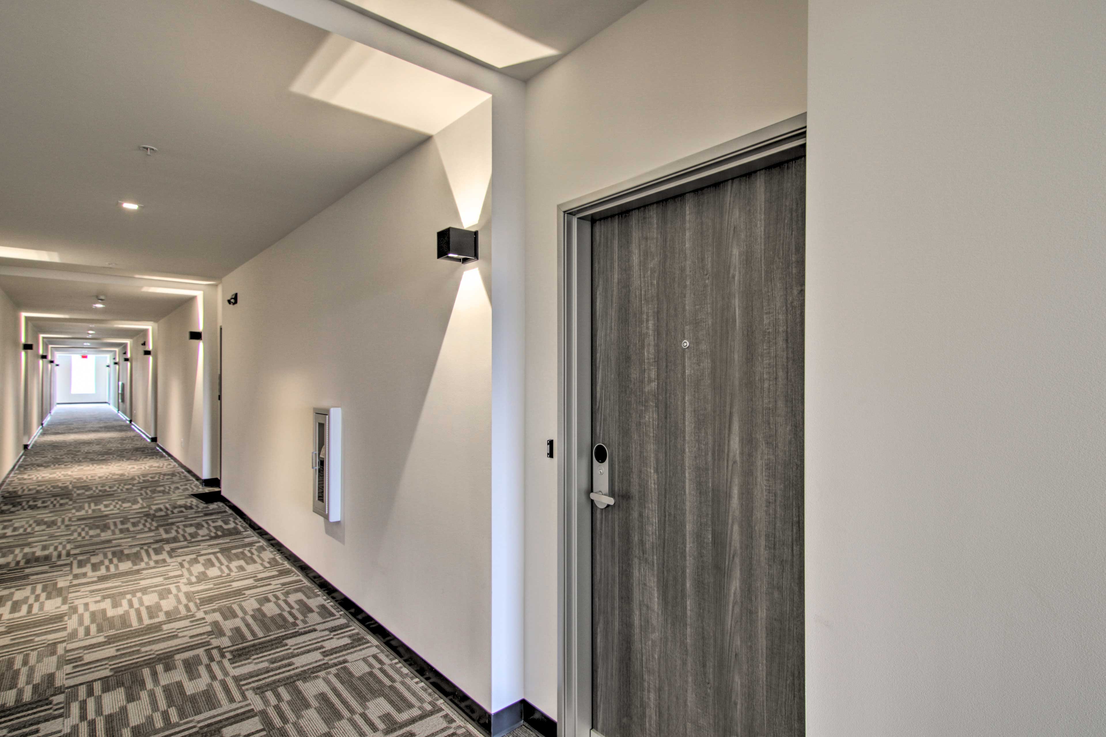 Unit Access Hallway | Shared Building Elevators