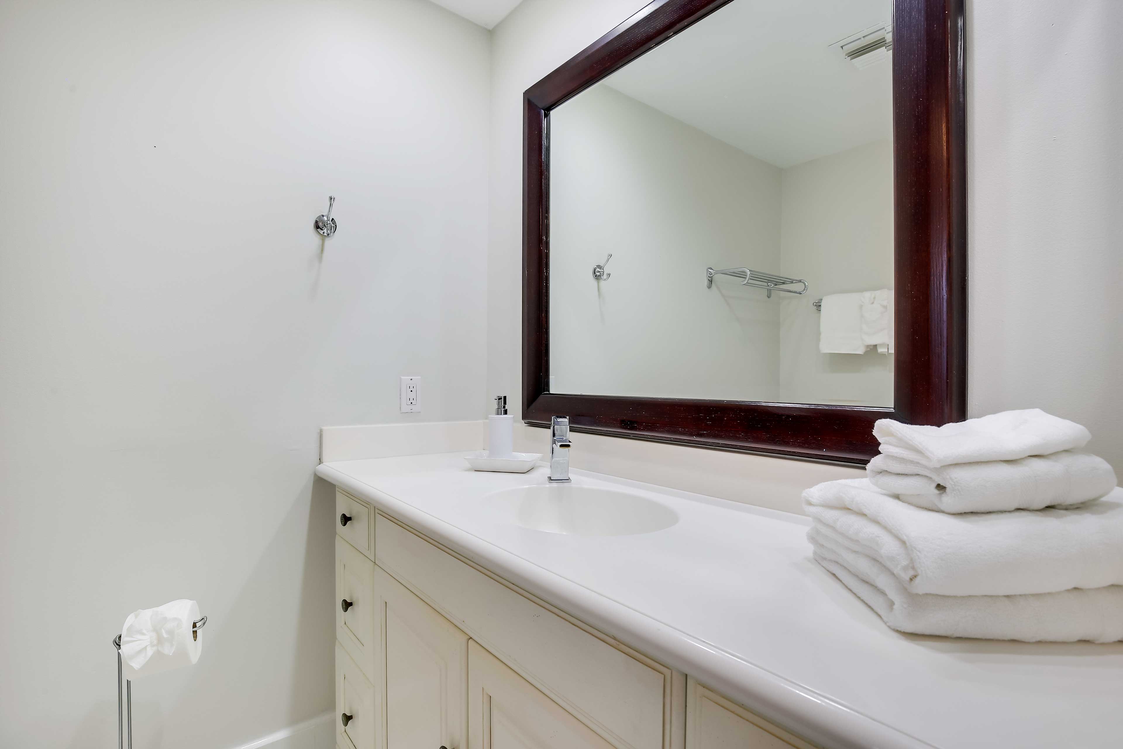 En-Suite Bathroom | Towels & Linens Provided