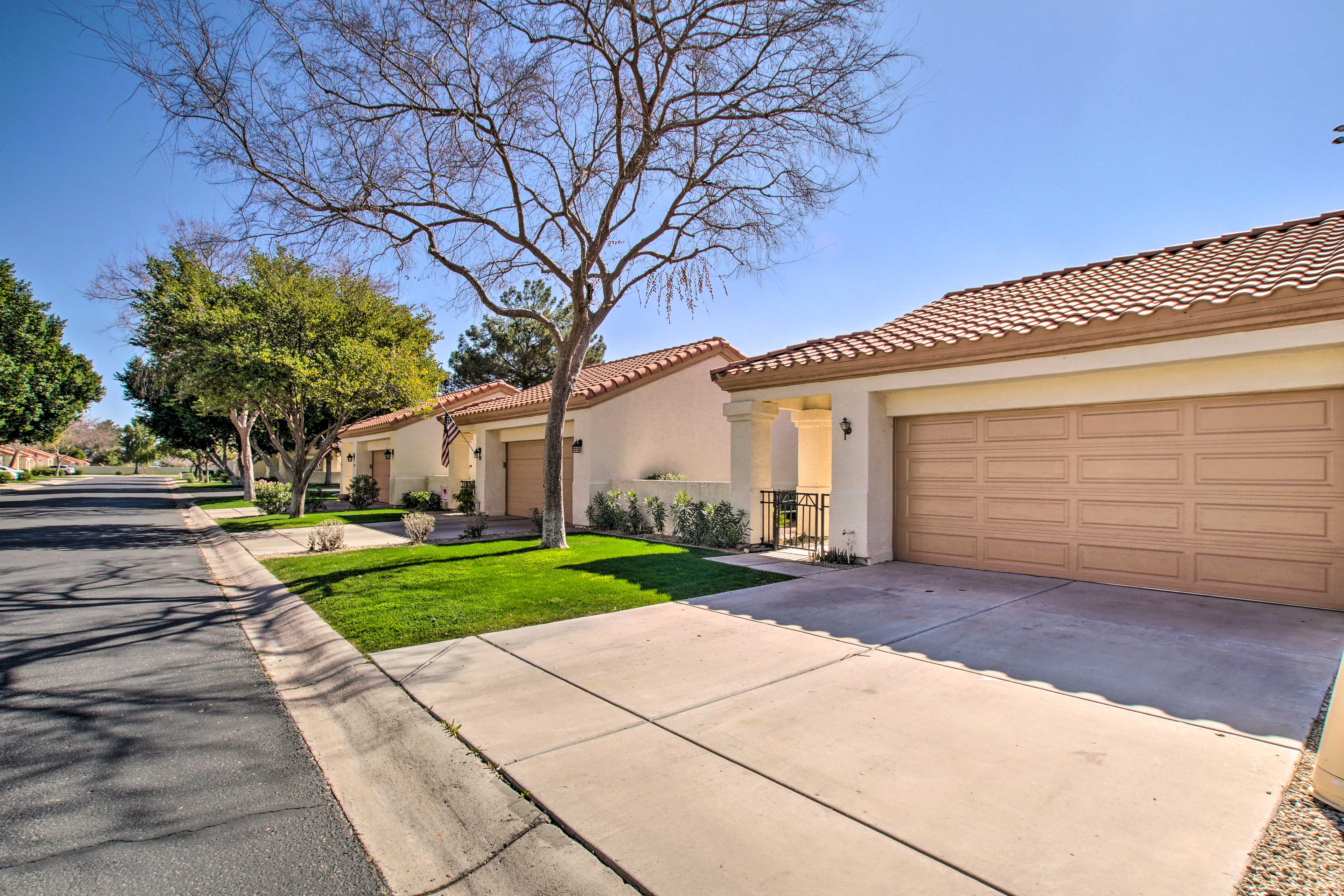 Townhome Exterior | Garage Parking (2 Vehicles) | Driveway Parking (2 Vehicles)