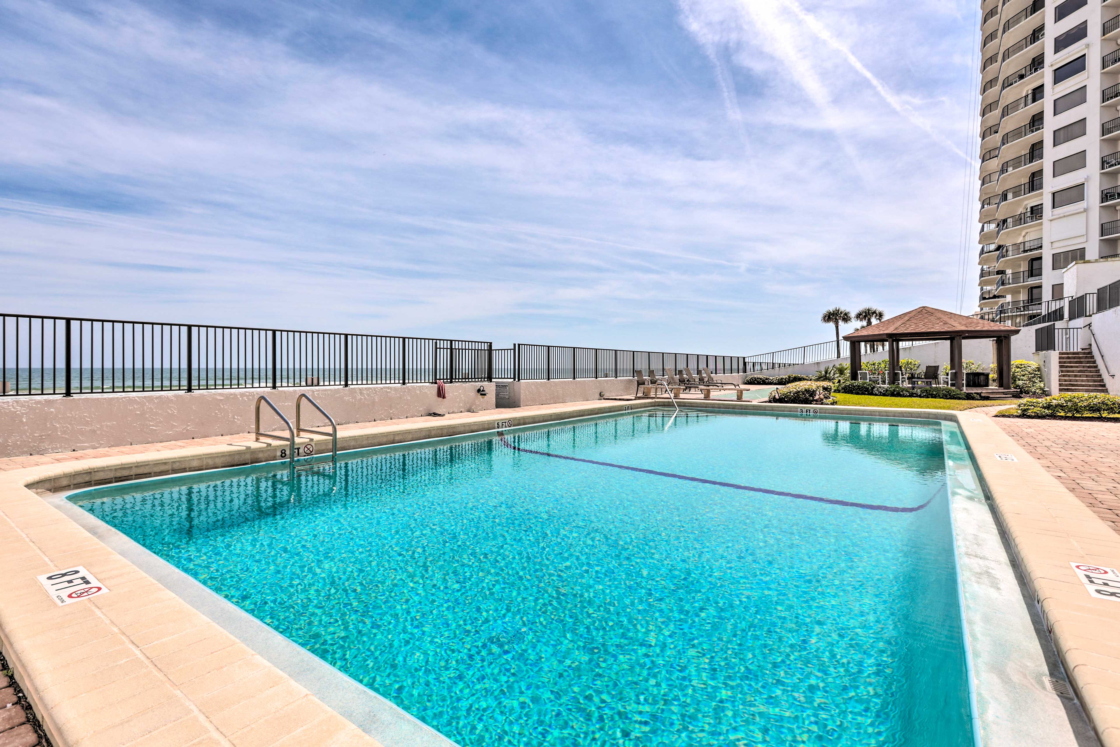 Community Amenities | Pool | Dining Space | Shuffleboard