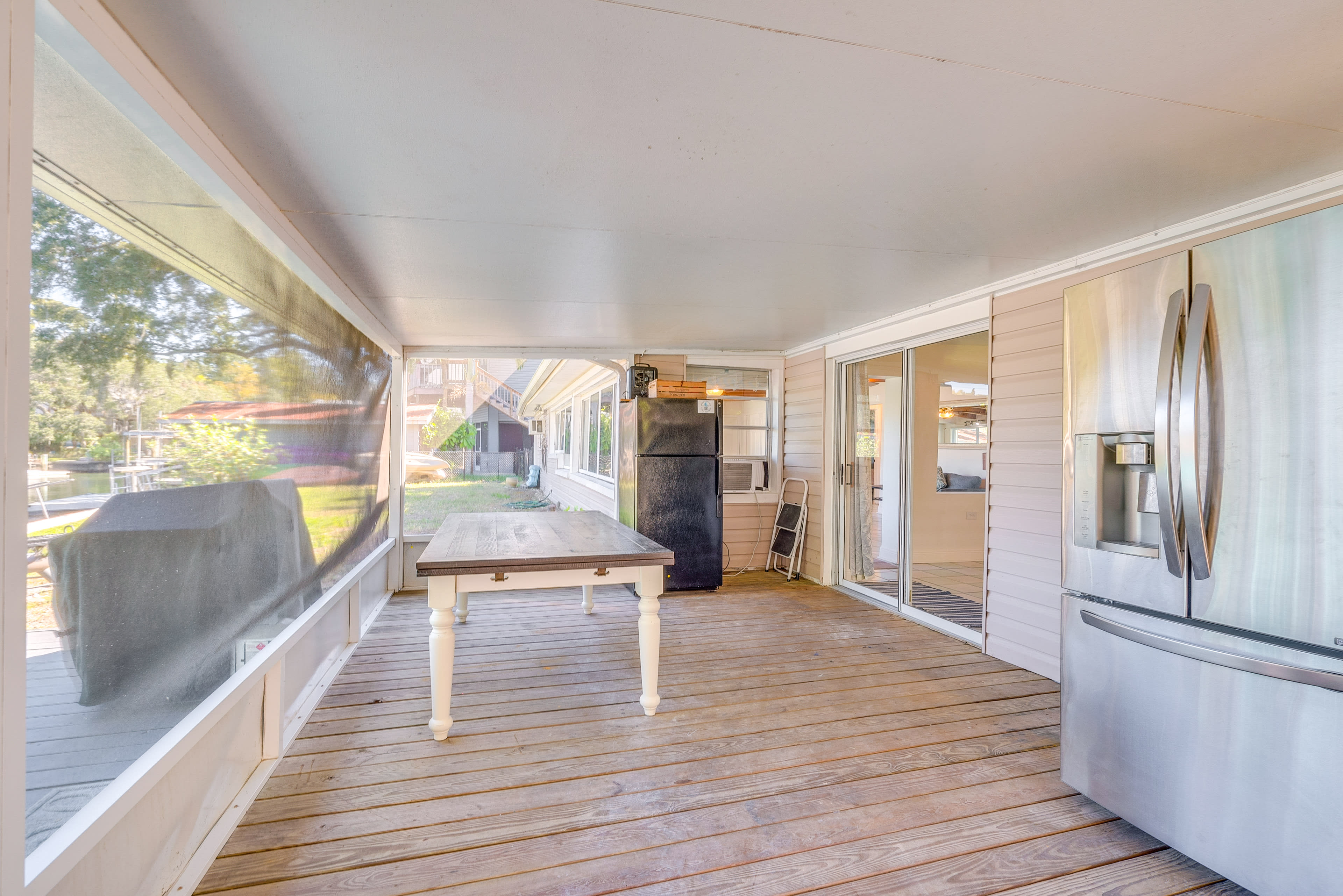 Screened Porch | Dining Table | Kayaks | Water Toys | Bicycles