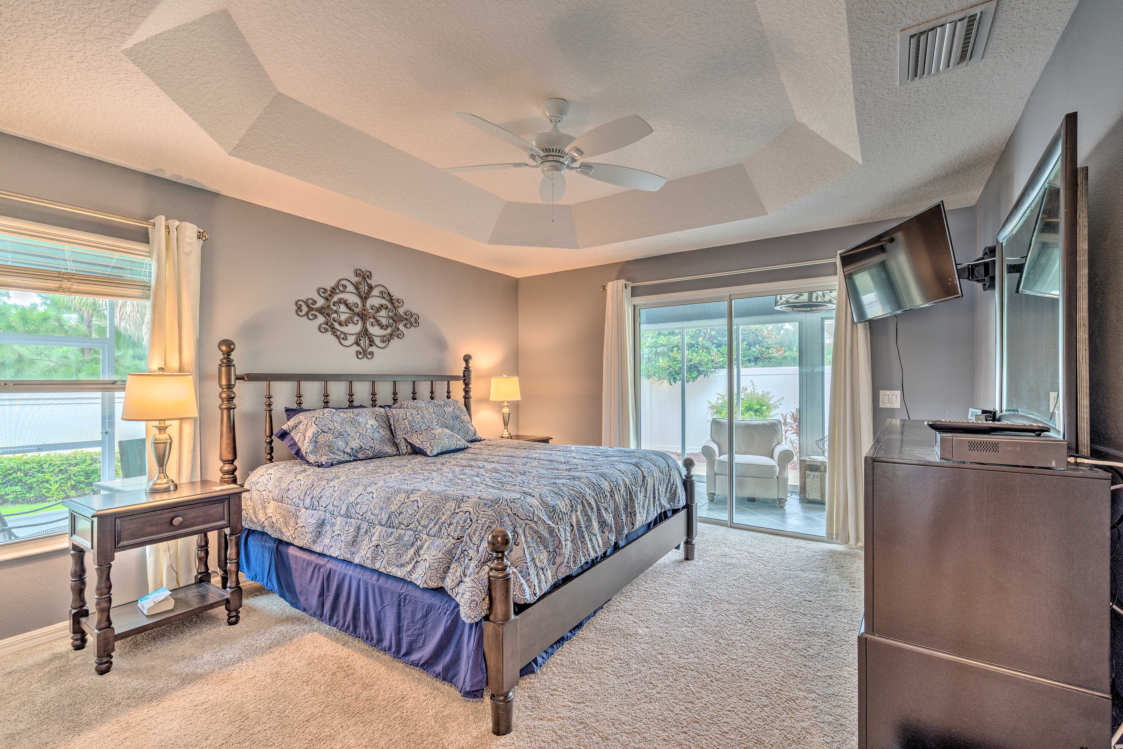 Bedroom 1 | King Bed | Smart TV w/ Cable | Screened-In Porch Access