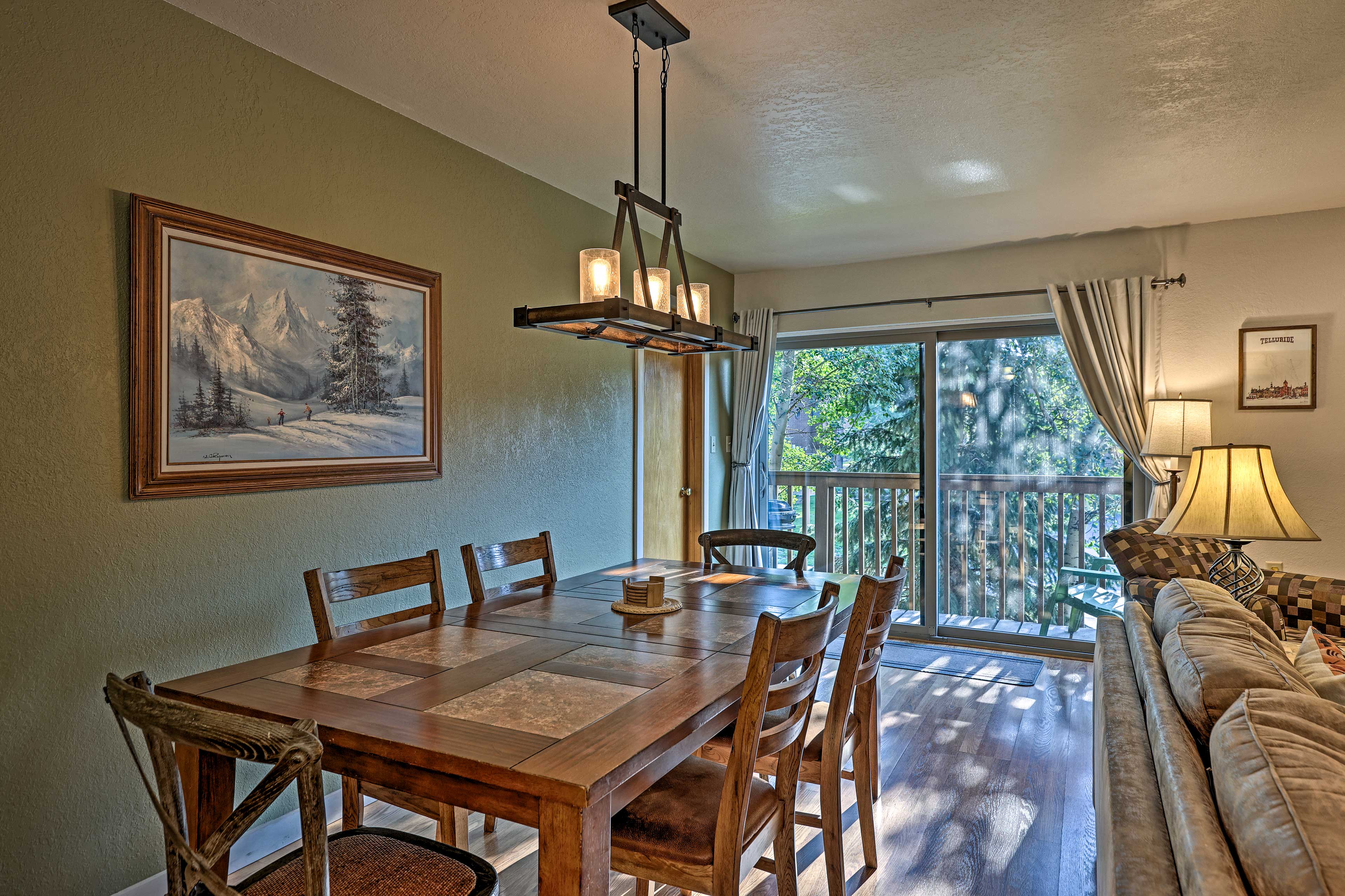 Dining Area | Dishware & Flatware | Balcony Access