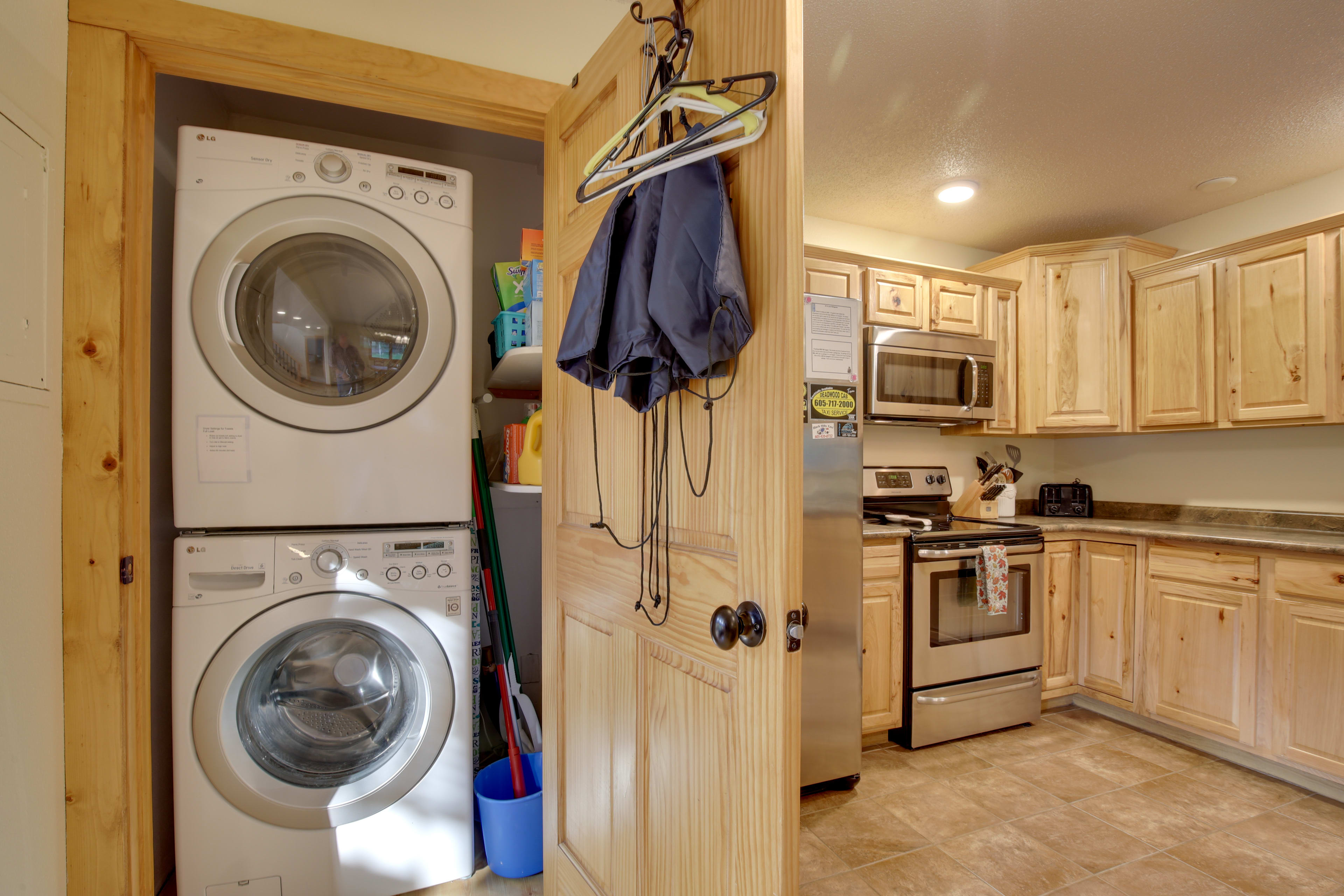 Kitchen | Washer & Dryer Available | Staircase to Loft