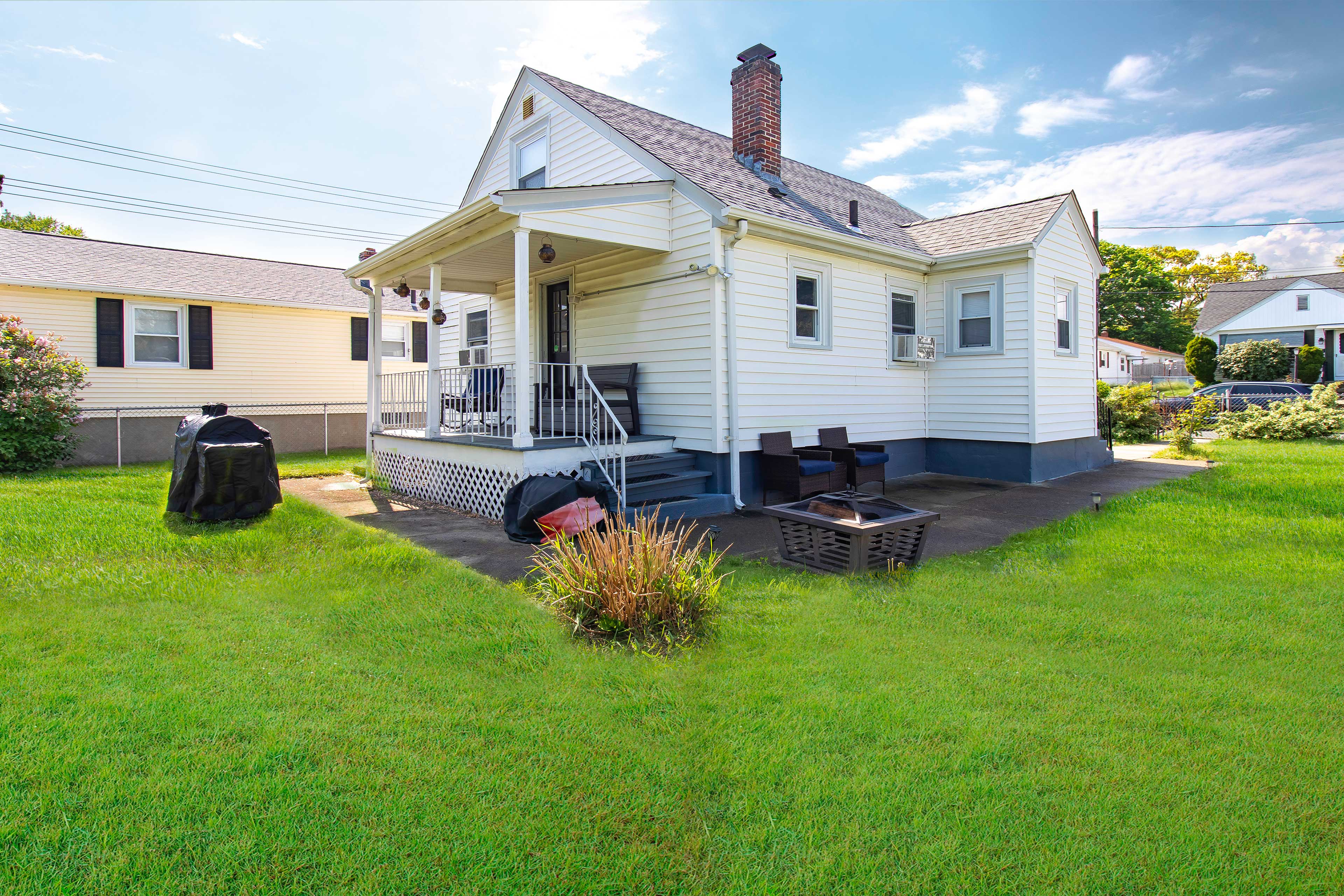 Exterior | Charcoal Grill | 3 Stairs Required to Enter Home