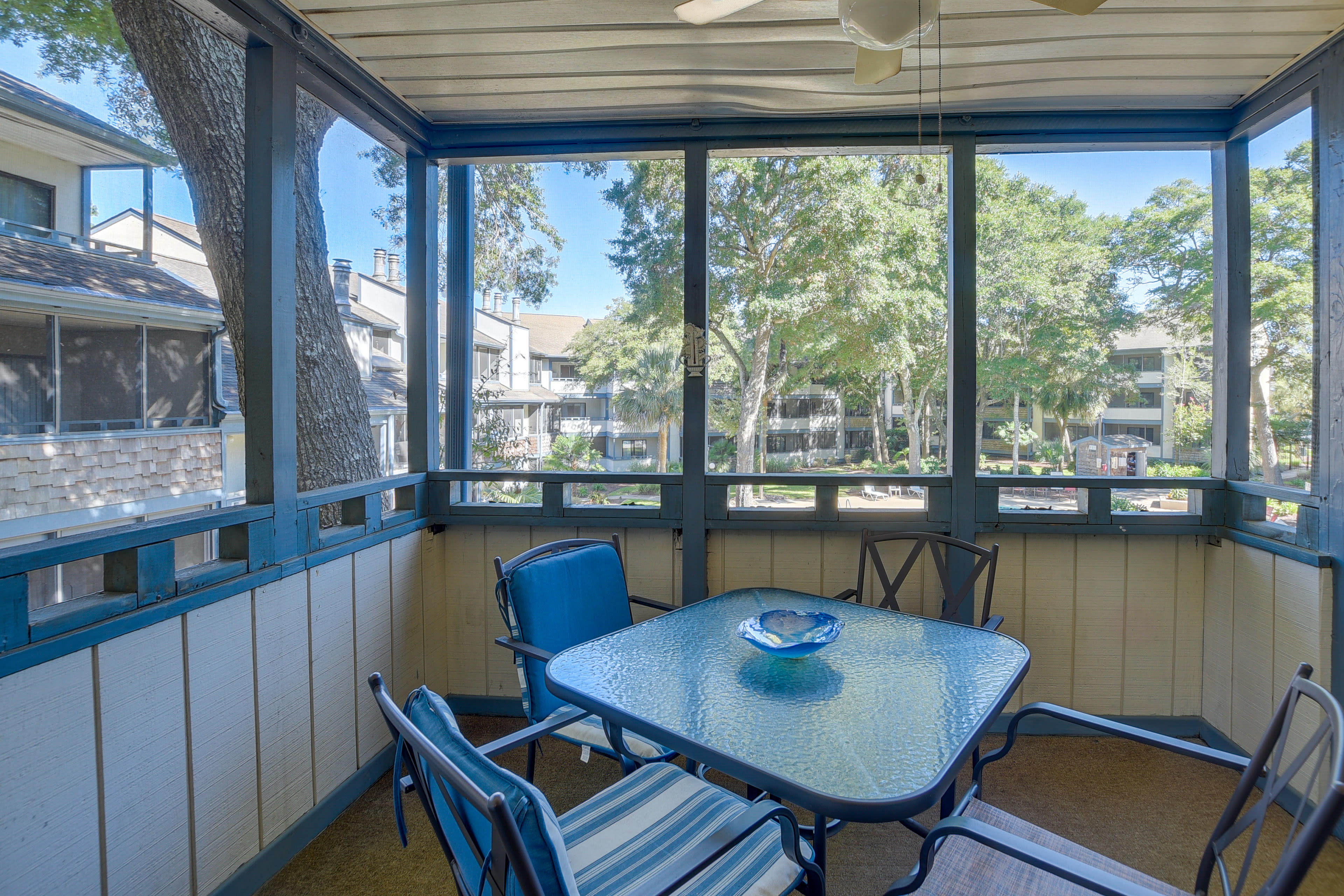 Screened Balcony | Outdoor Dining Table | Pool View