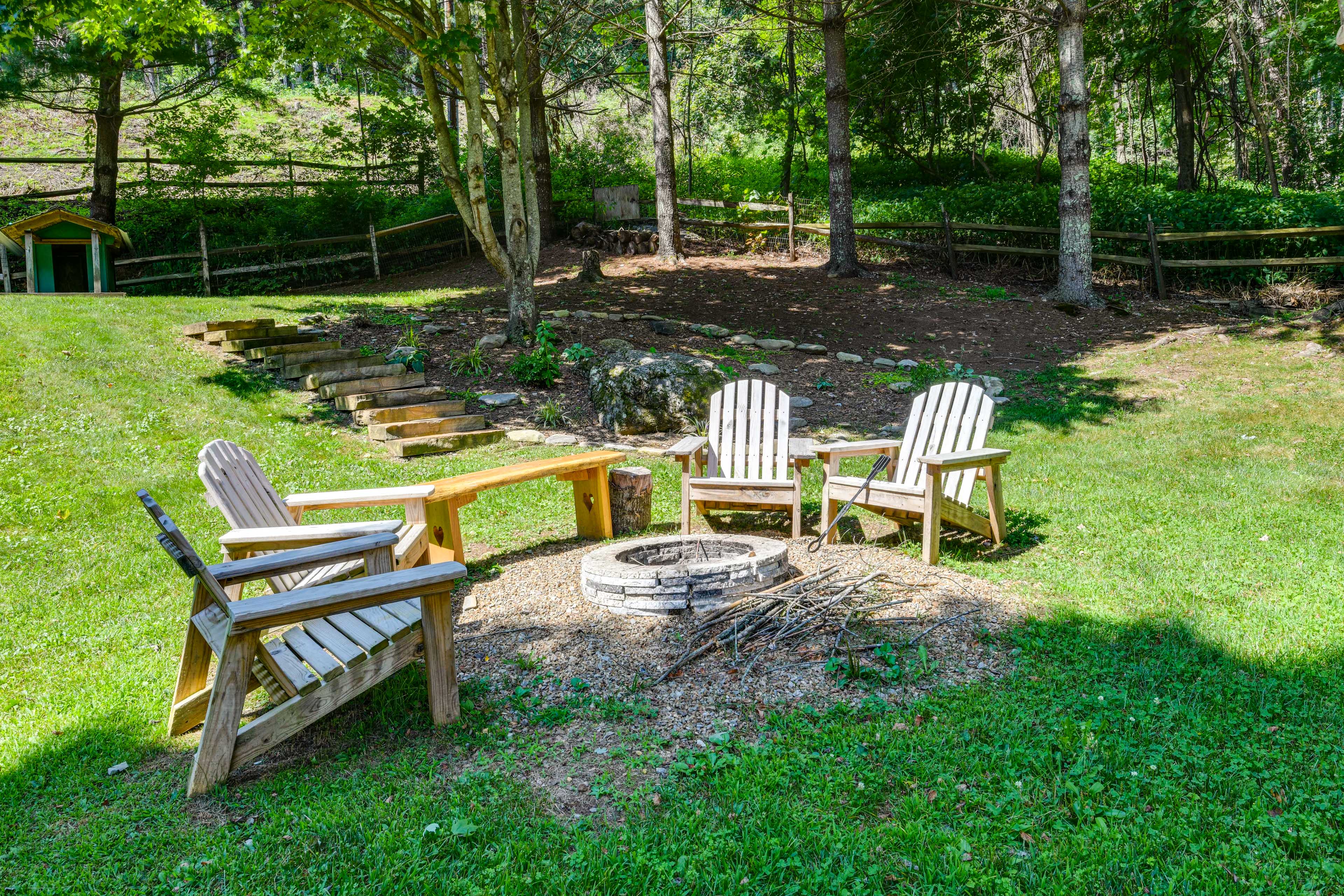 Fenced Yard | 2 Exterior Security Cameras (Facing Out) | Wood-Burning Fire Pit