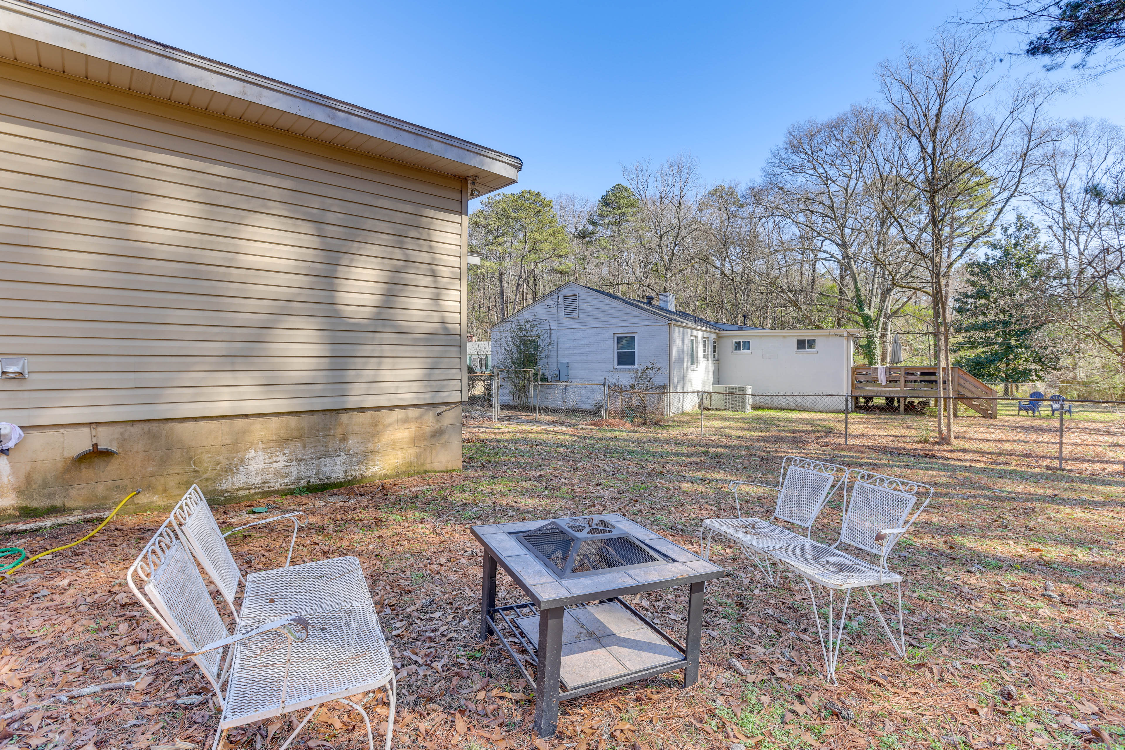 Cottage Exterior | Wood-Burning Fire Pit | Fenced Yard