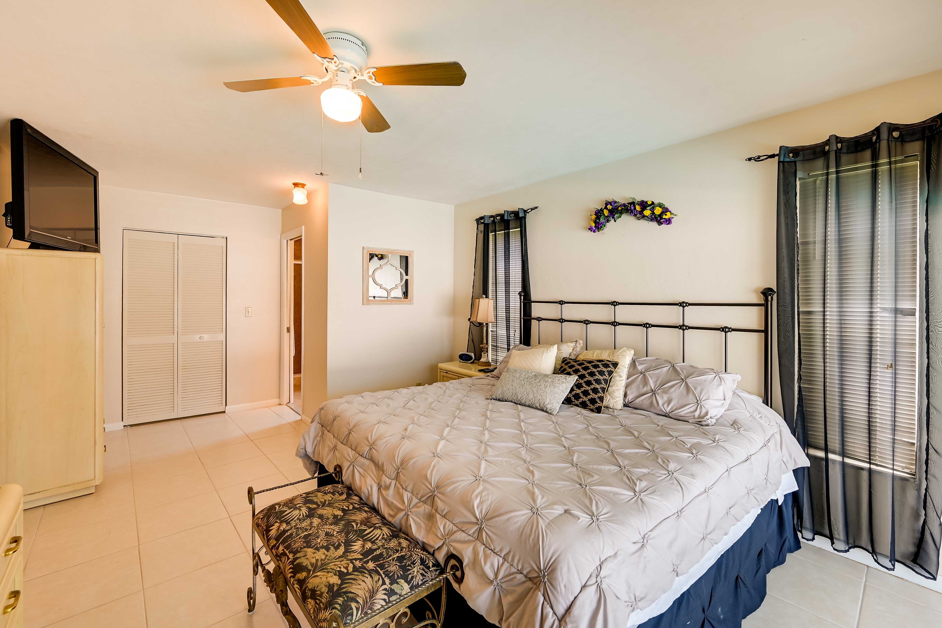 Bedroom 1 | King Bed | Access to Lanai | Linens/Towels Provided