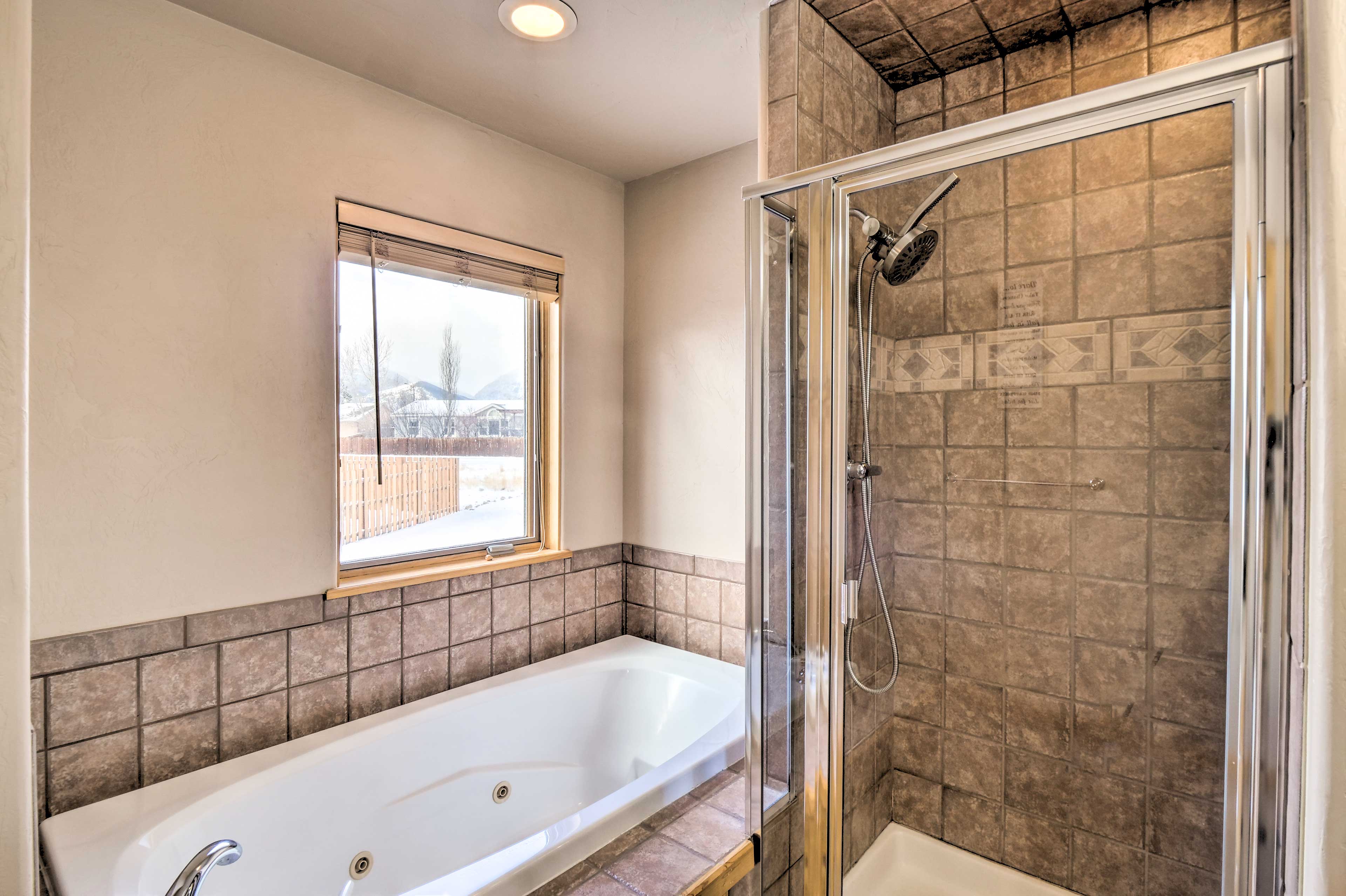 En-Suite Bathroom | Towels & Linens Provided