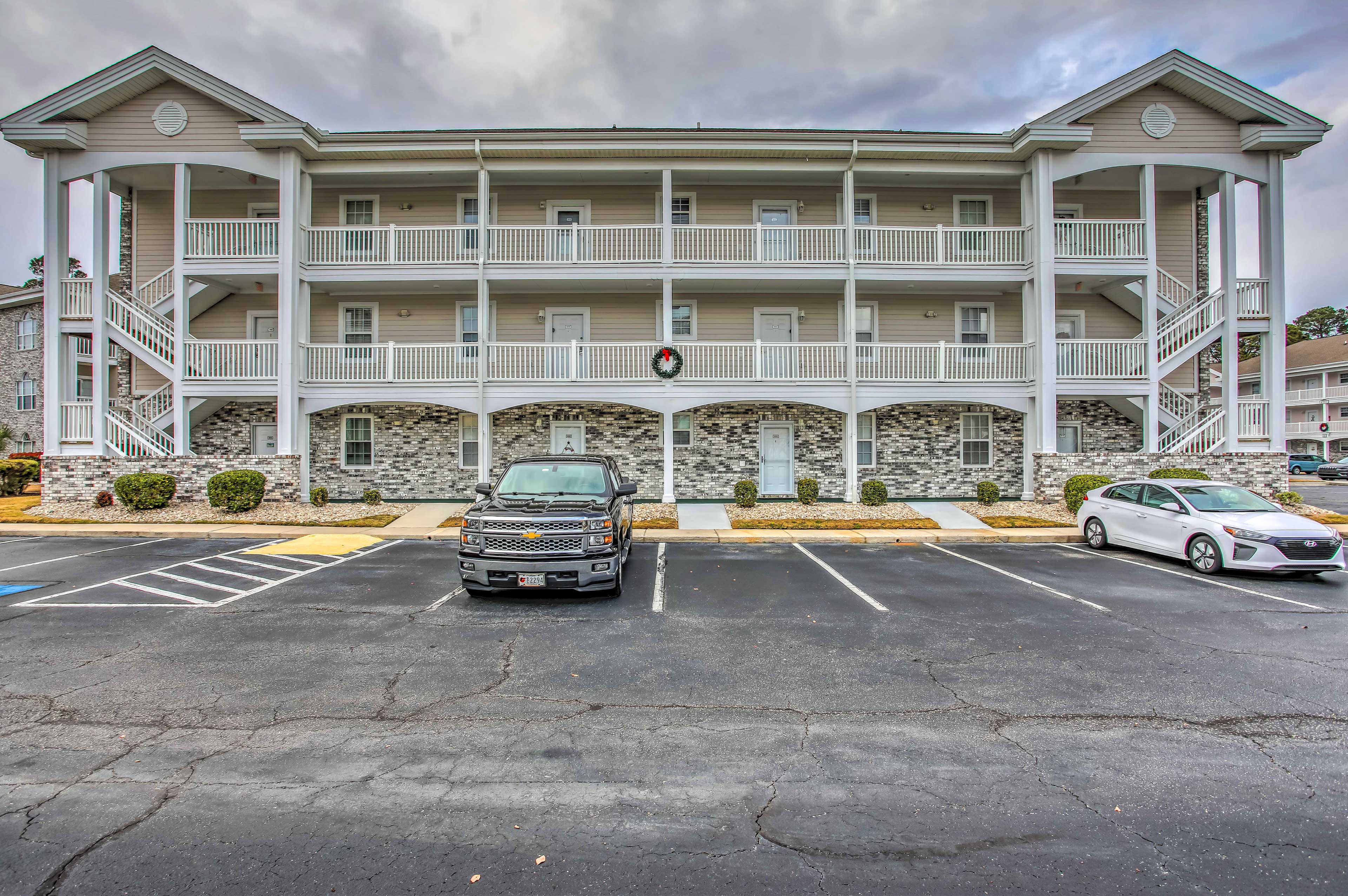 Condo Exterior | Community Parking Lot (2 Vehicles)