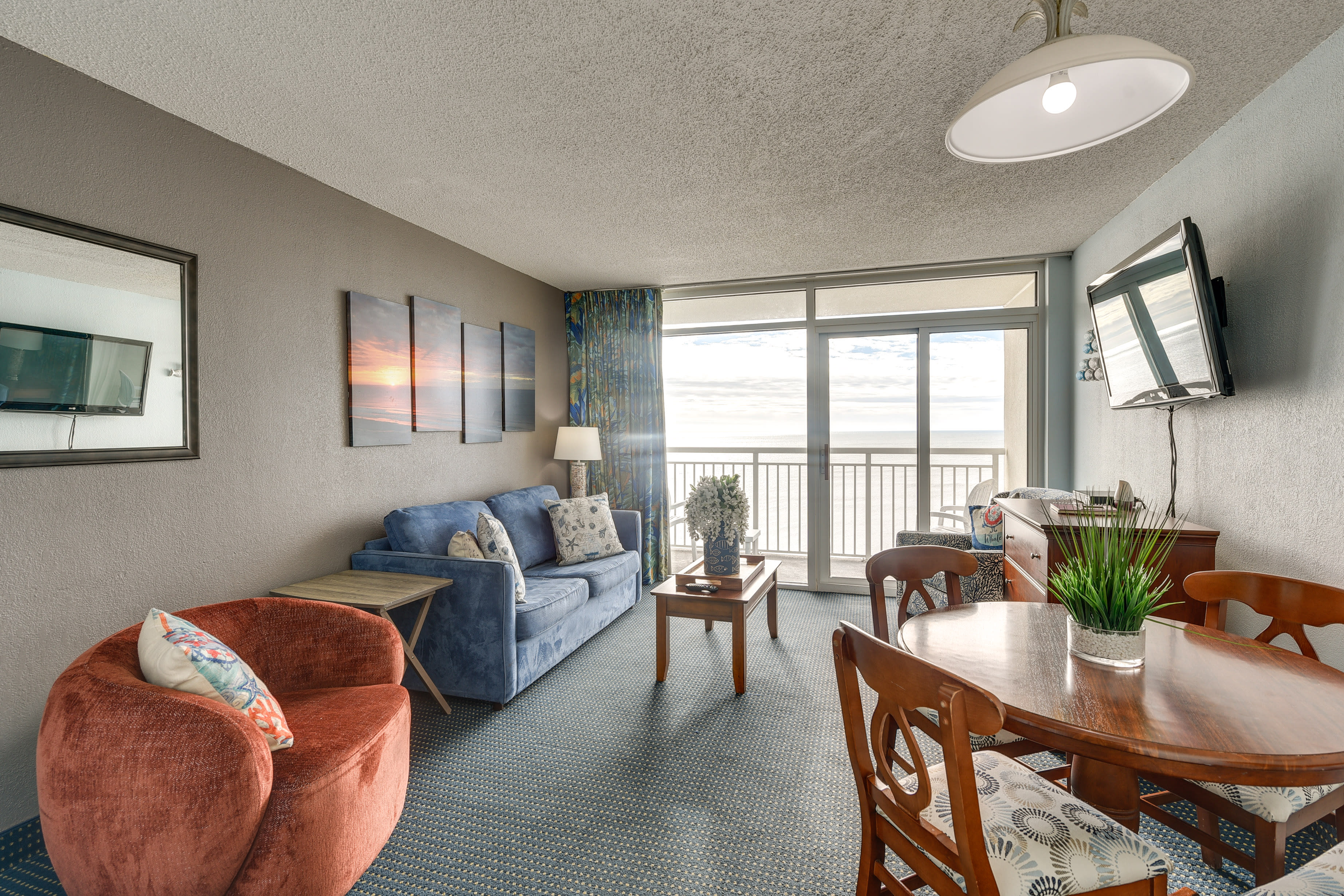 Living Room | Amenity Wristbands Provided | Elevator Access | Coin Laundry