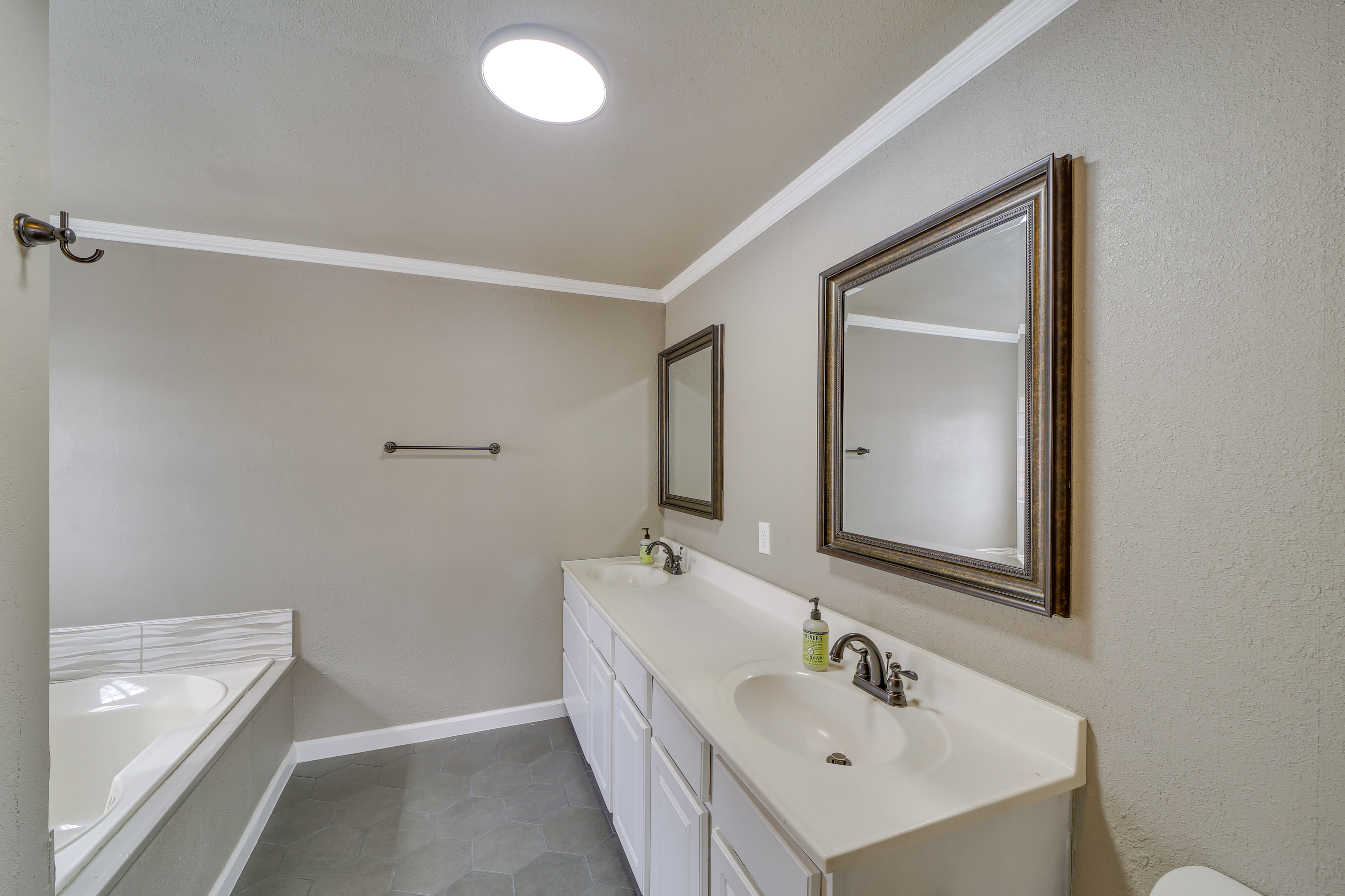 En-Suite Bathroom | Towels & Linens Provided | Main Level