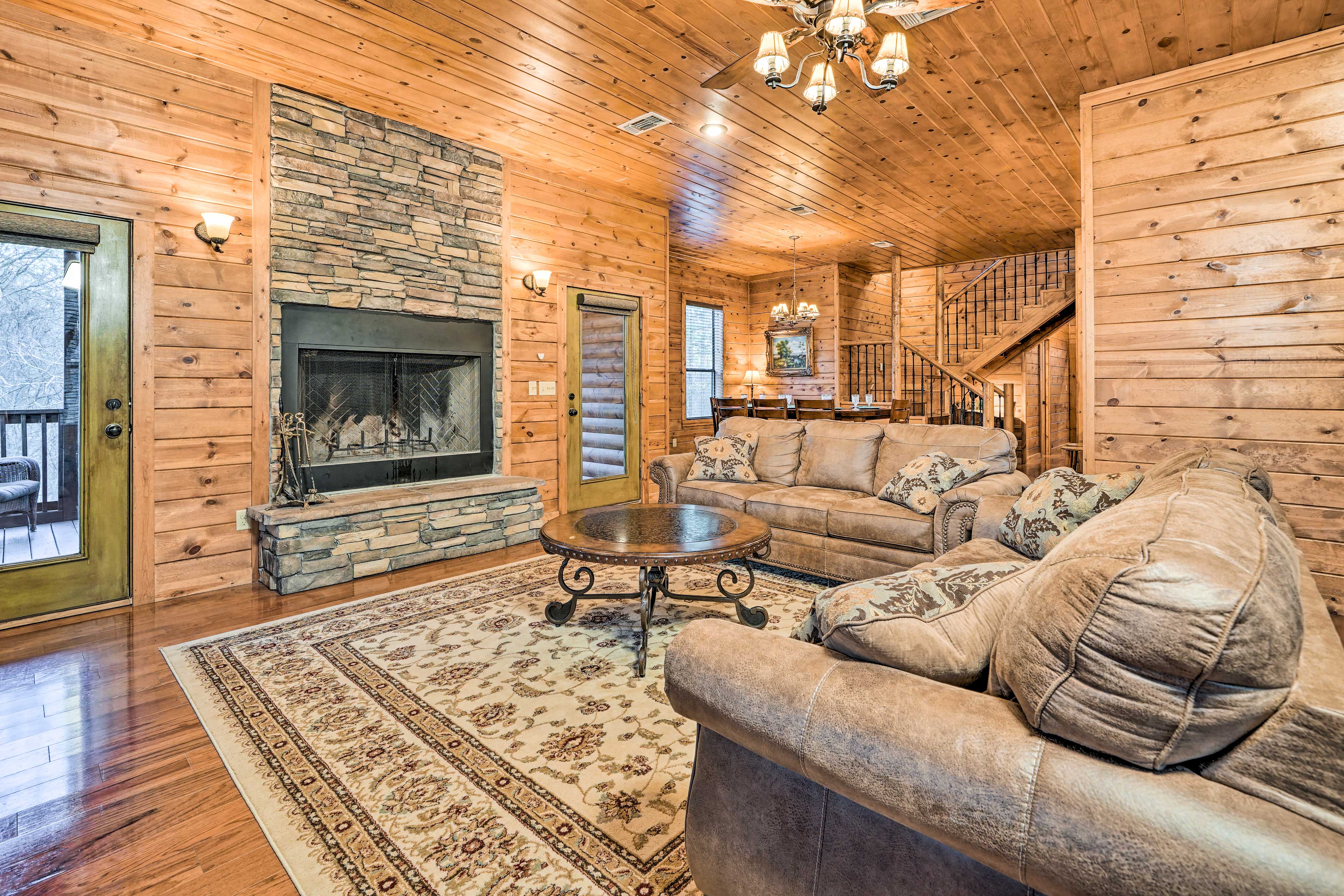 Living Room | 1st Floor | Wood-Burning Fireplace | Sleeper Sofa | Deck Access