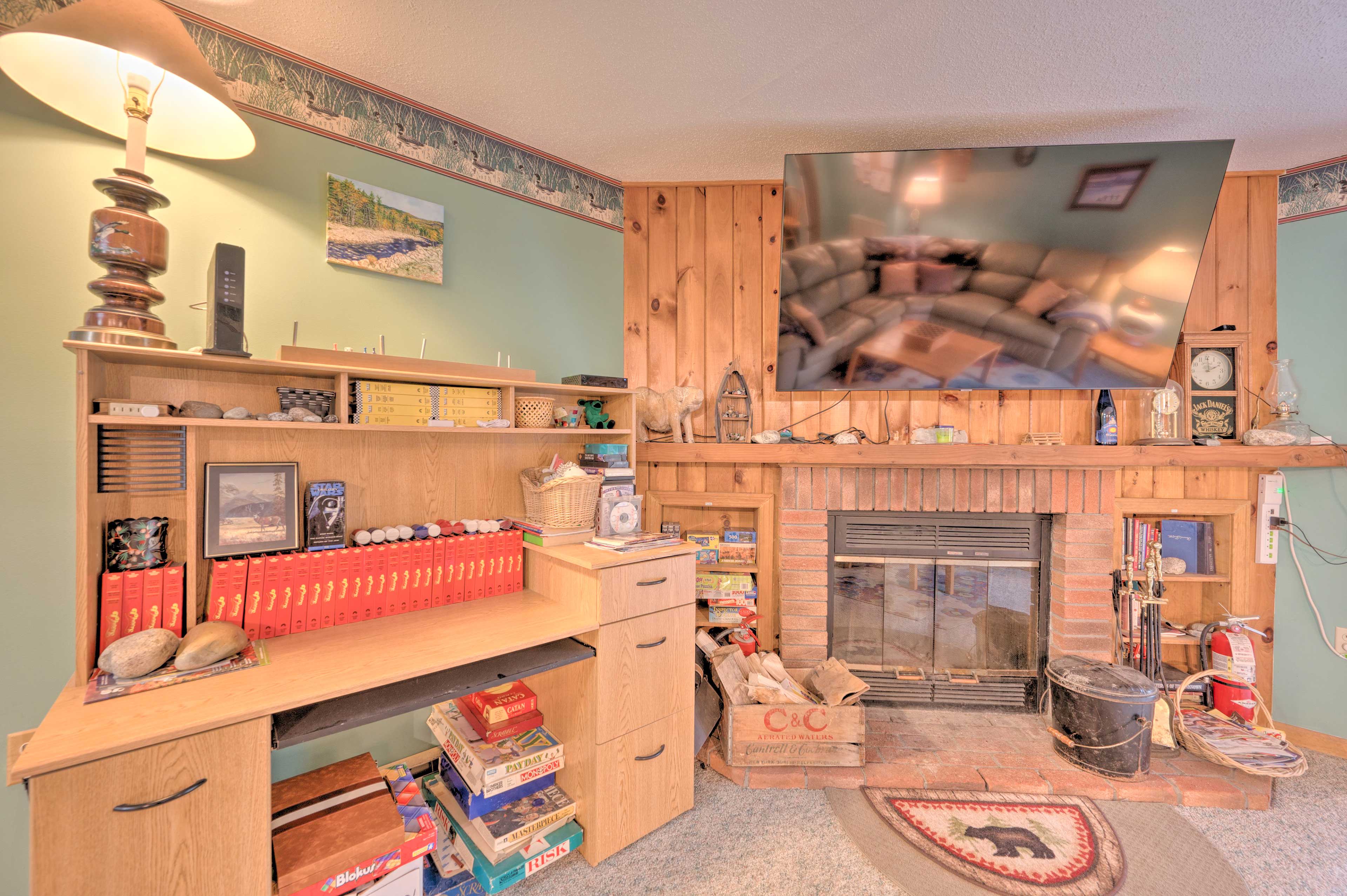 Living Room | Books & Board Games | Wood-Burning Fireplace